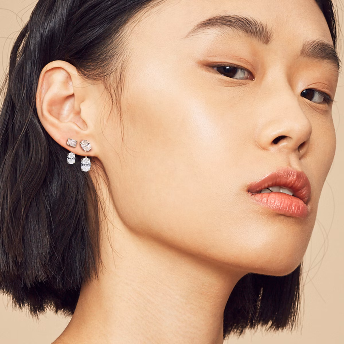 Solitaire Stud & Ear Jacket | 14k | White Gold | bottomDiamondShape: Emerald | topDiamondShape: Oval | caratWeight: 2ct