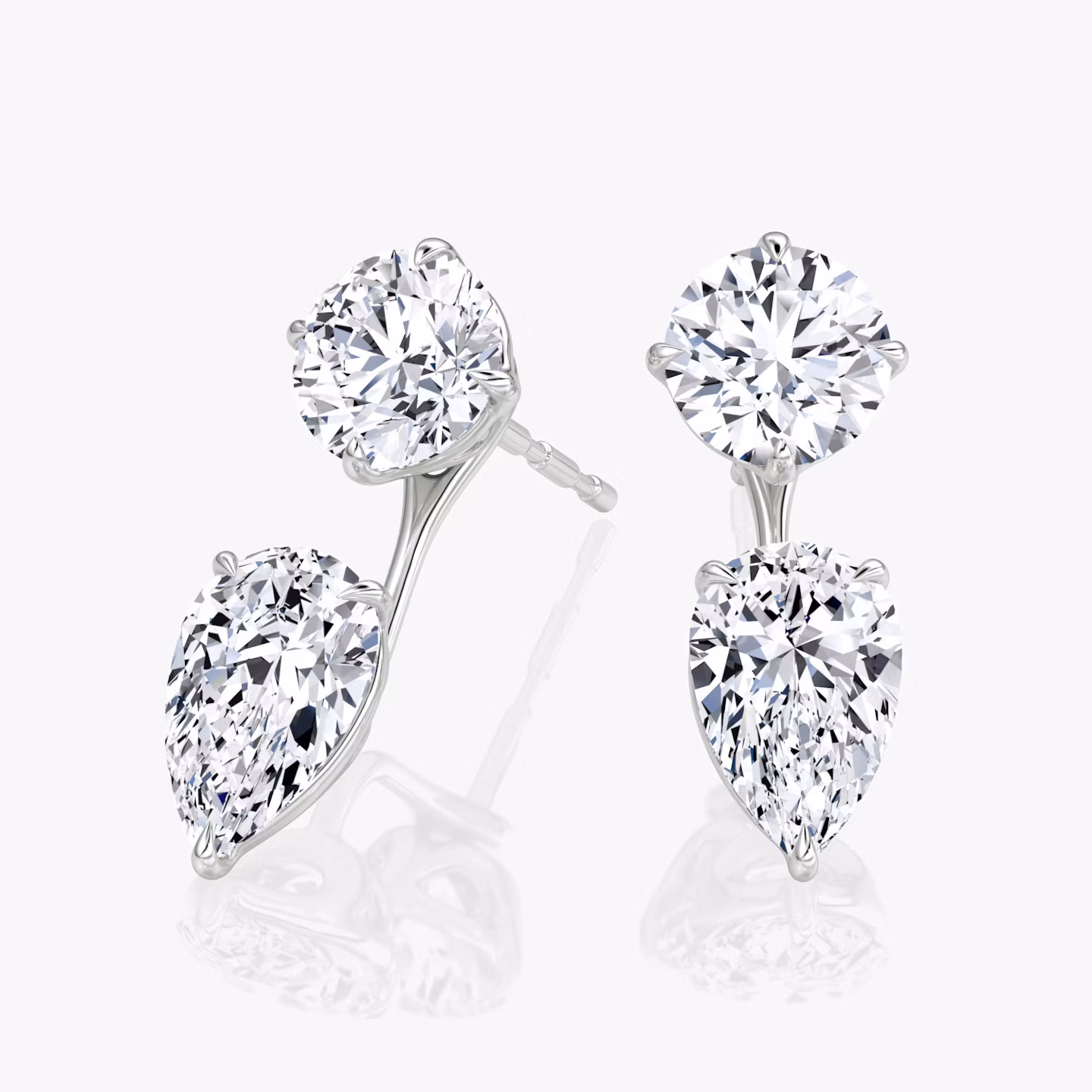 Solitaire Stud & Ear Jacket | 14k | White Gold | bottomDiamondShape: Pear | topDiamondShape: Round Brilliant | caratWeight: 2ct