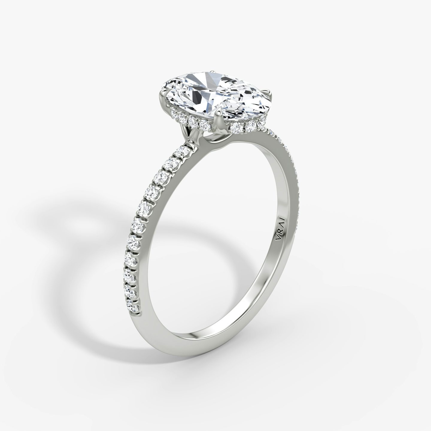 The Signature | Oval | 18k | White Gold | bandAccent: Pavé | bandWidth: standard | hiddenHalo: yes | diamondOrientation: vertical | caratWeight: other