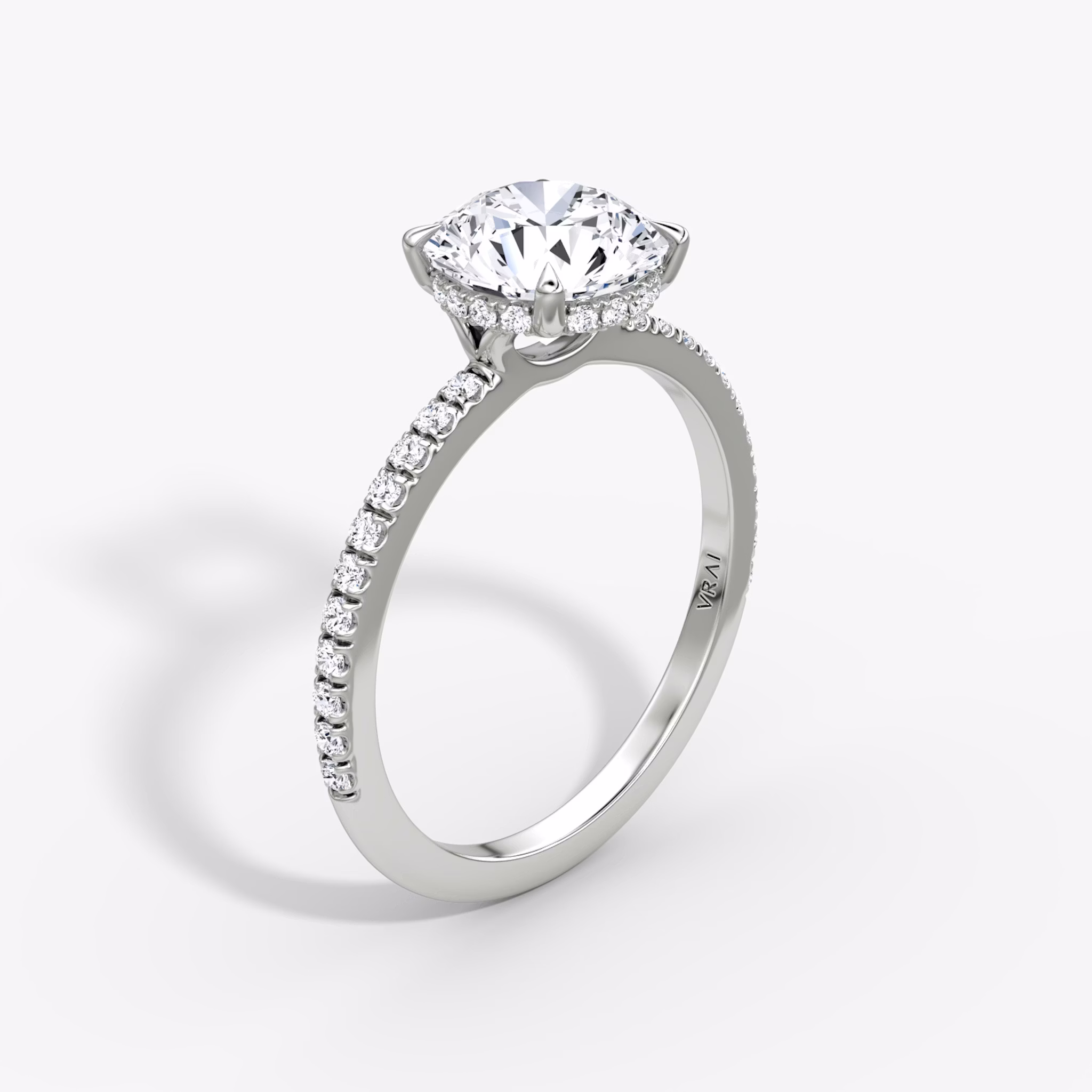 The Signature | Round Brilliant | 18k | White Gold | bandAccent: Pavé | bandWidth: standard | caratWeight: other | hiddenHalo: yes | diamondOrientation: vertical
