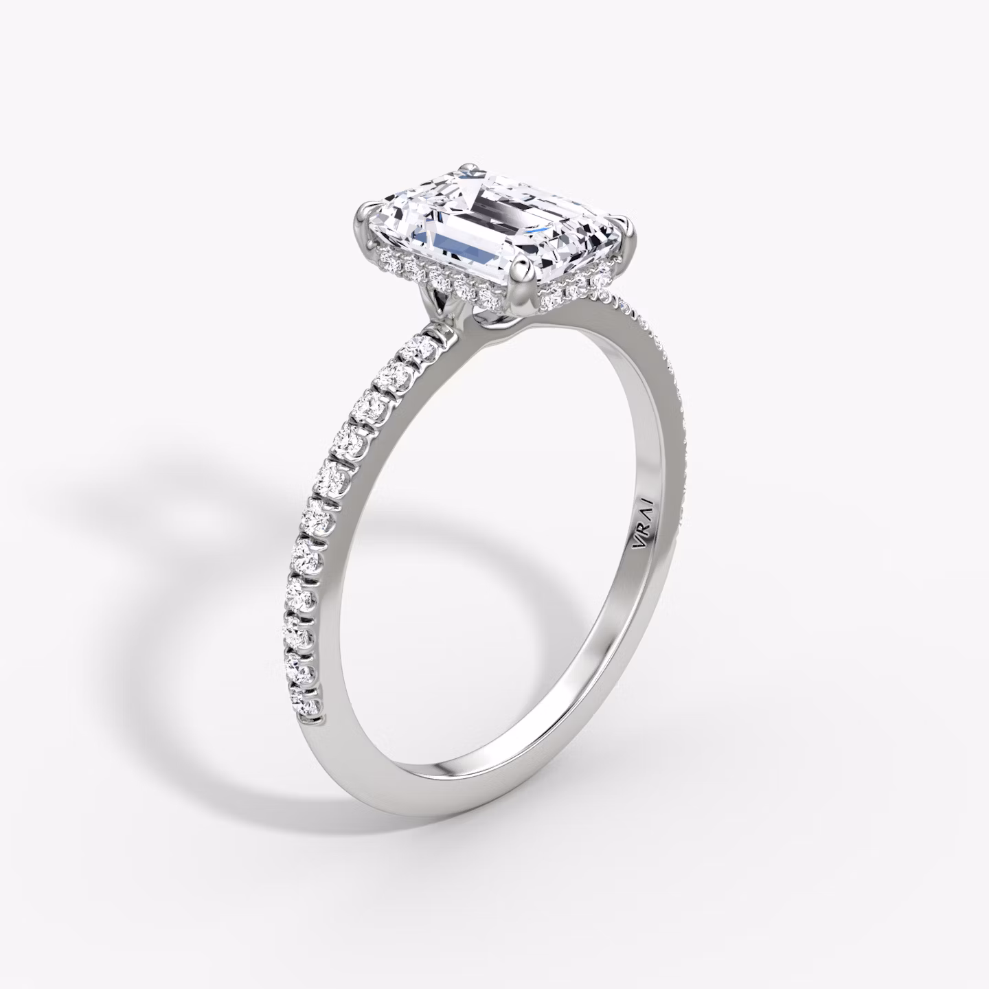 The Signature | Emerald | 18k | White Gold | bandAccent: Pavé | bandWidth: standard | hiddenHalo: yes | diamondOrientation: vertical | caratWeight: other