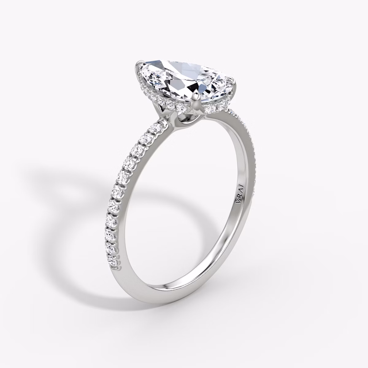 The Signature | Pear | Platinum | bandAccent: Pavé | bandWidth: standard | hiddenHalo: yes | diamondOrientation: vertical | caratWeight: other
