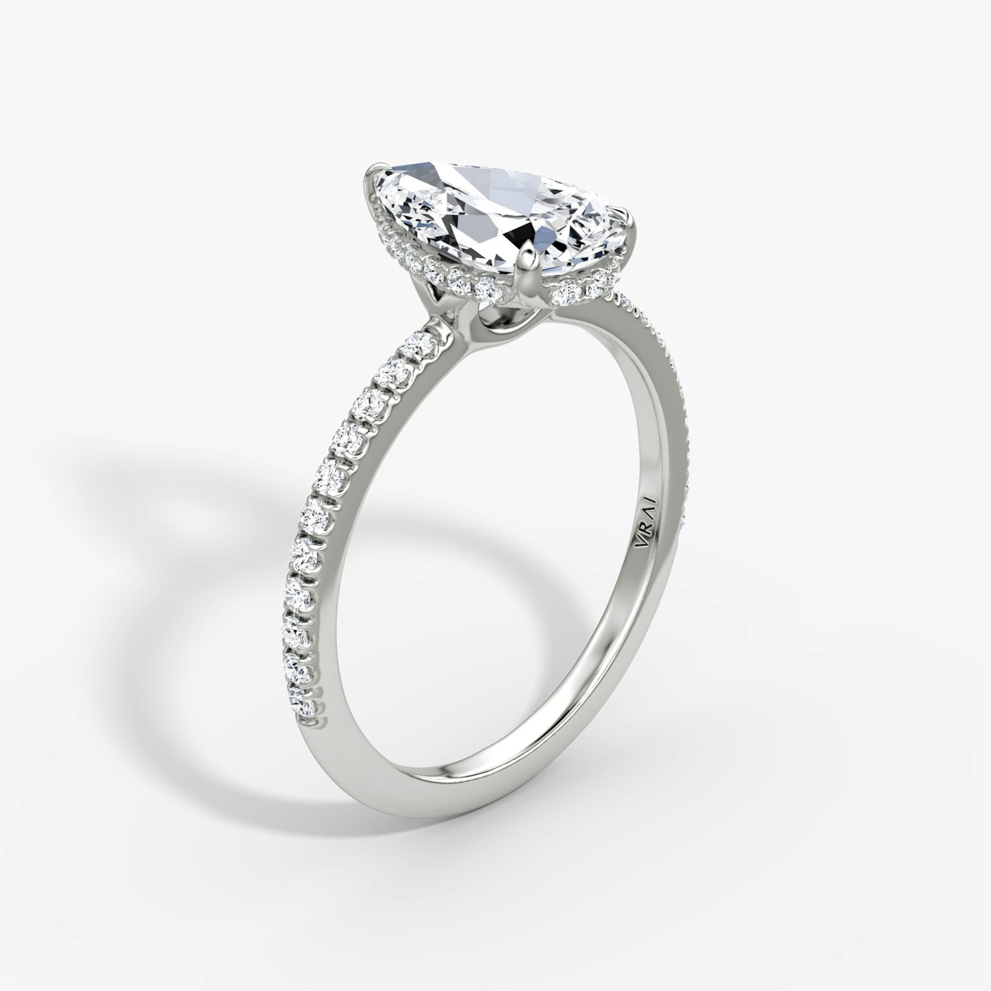 The Signature | Pear | 18k | White Gold | bandAccent: Pavé | bandWidth: standard | hiddenHalo: yes | diamondOrientation: vertical | caratWeight: other