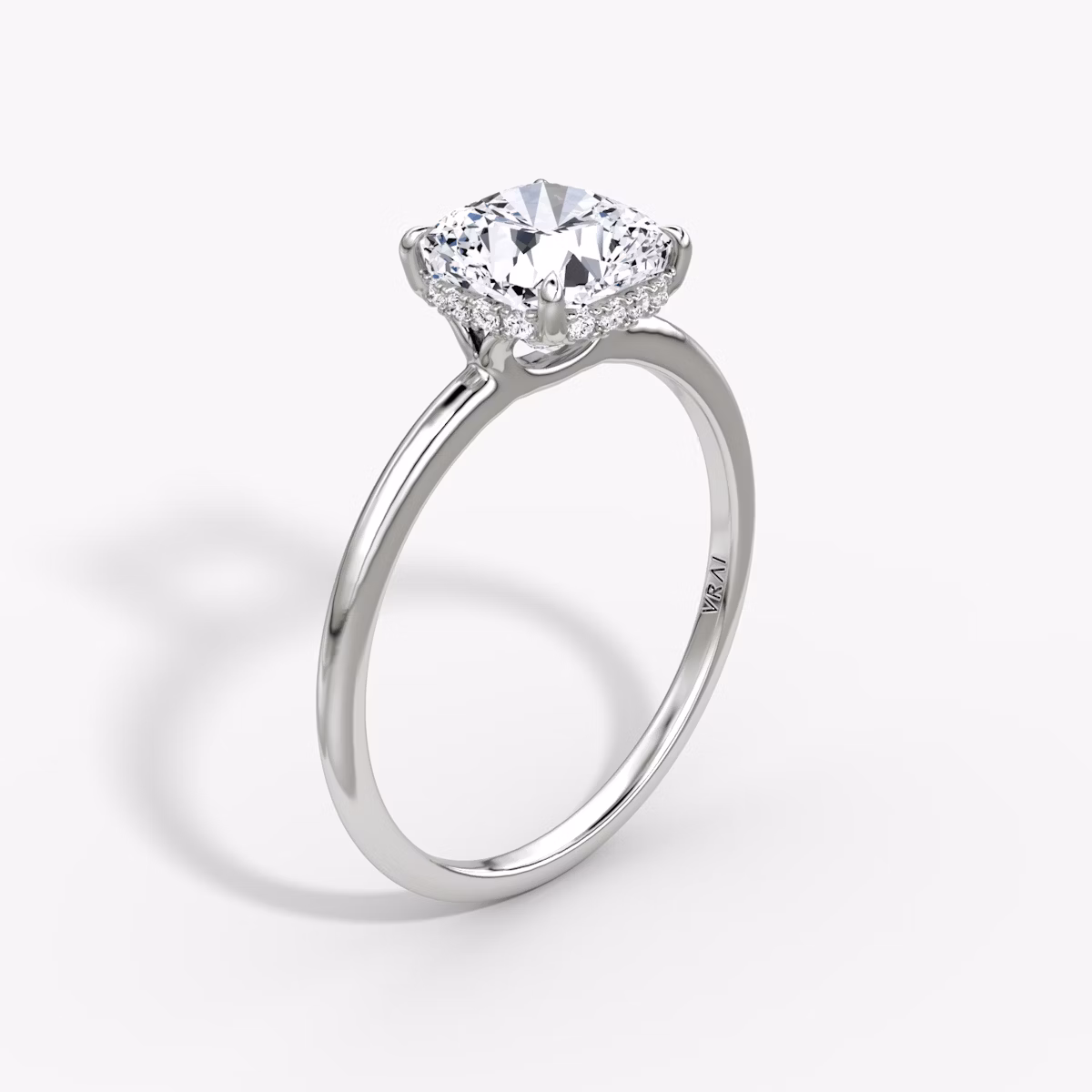 The Signature | Cushion | Platinum | bandAccent: Plain | bandWidth: standard | hiddenHalo: yes | diamondOrientation: vertical | caratWeight: other