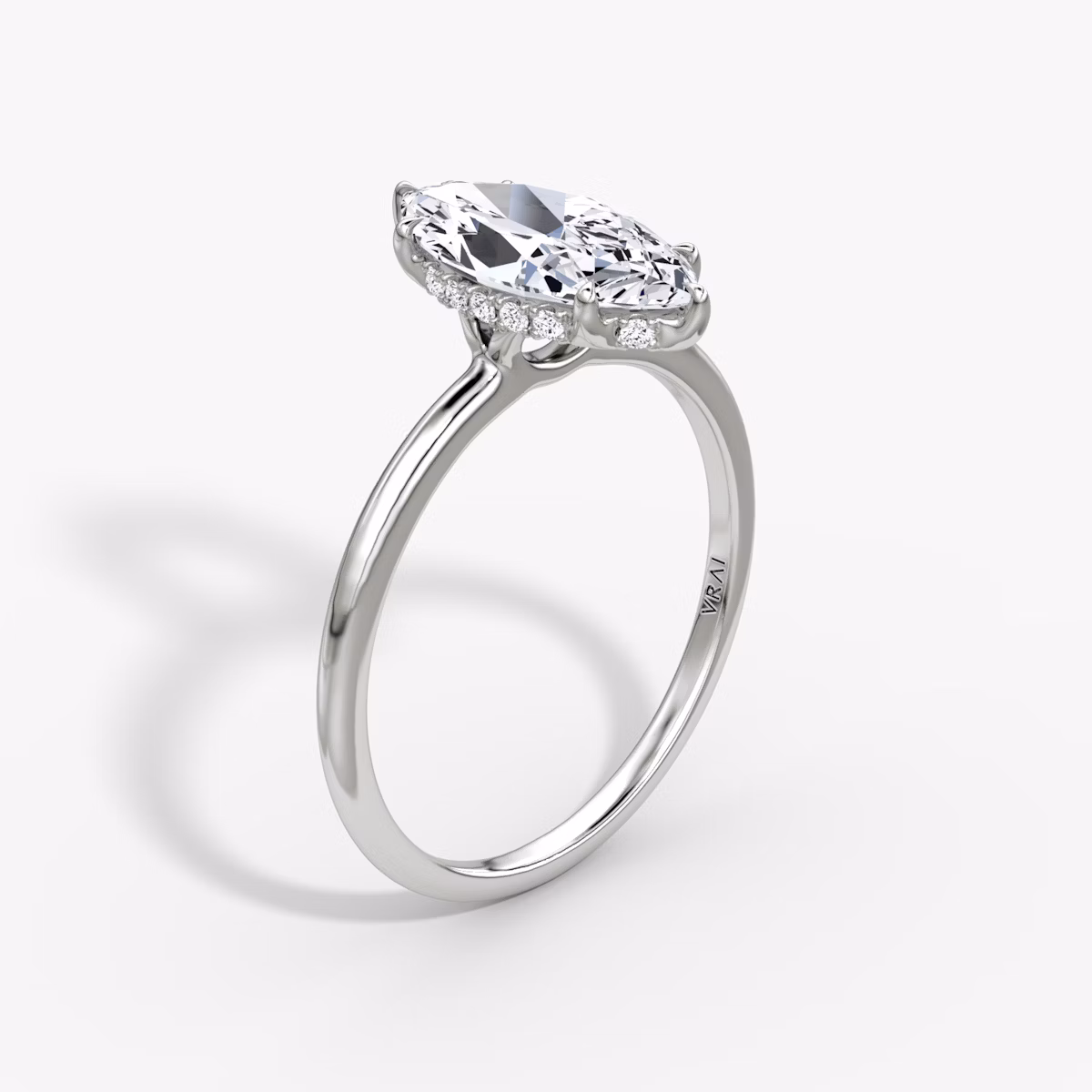 The Signature | Marquise | Platinum | bandAccent: Plain | bandWidth: standard | hiddenHalo: yes | diamondOrientation: vertical | caratWeight: other
