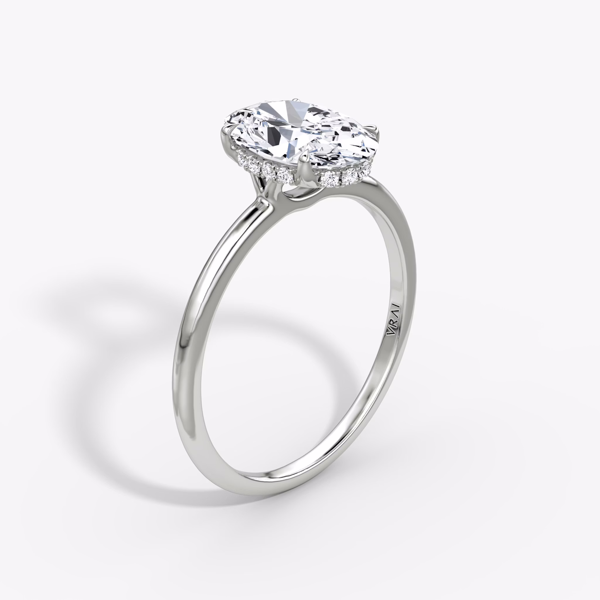 the signature hidden halo engagement ring oval plain platinum.