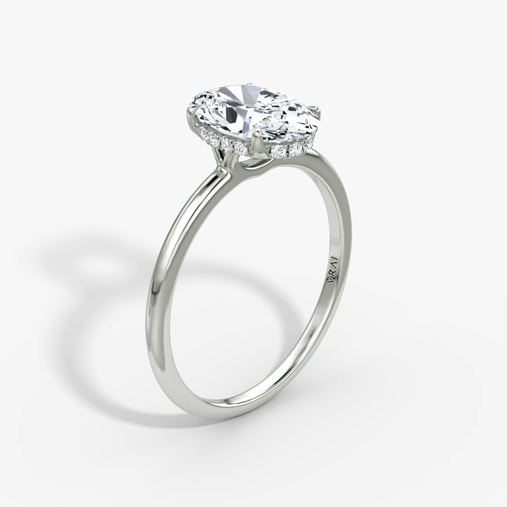 the signature hidden halo engagement ring oval plain platinum.