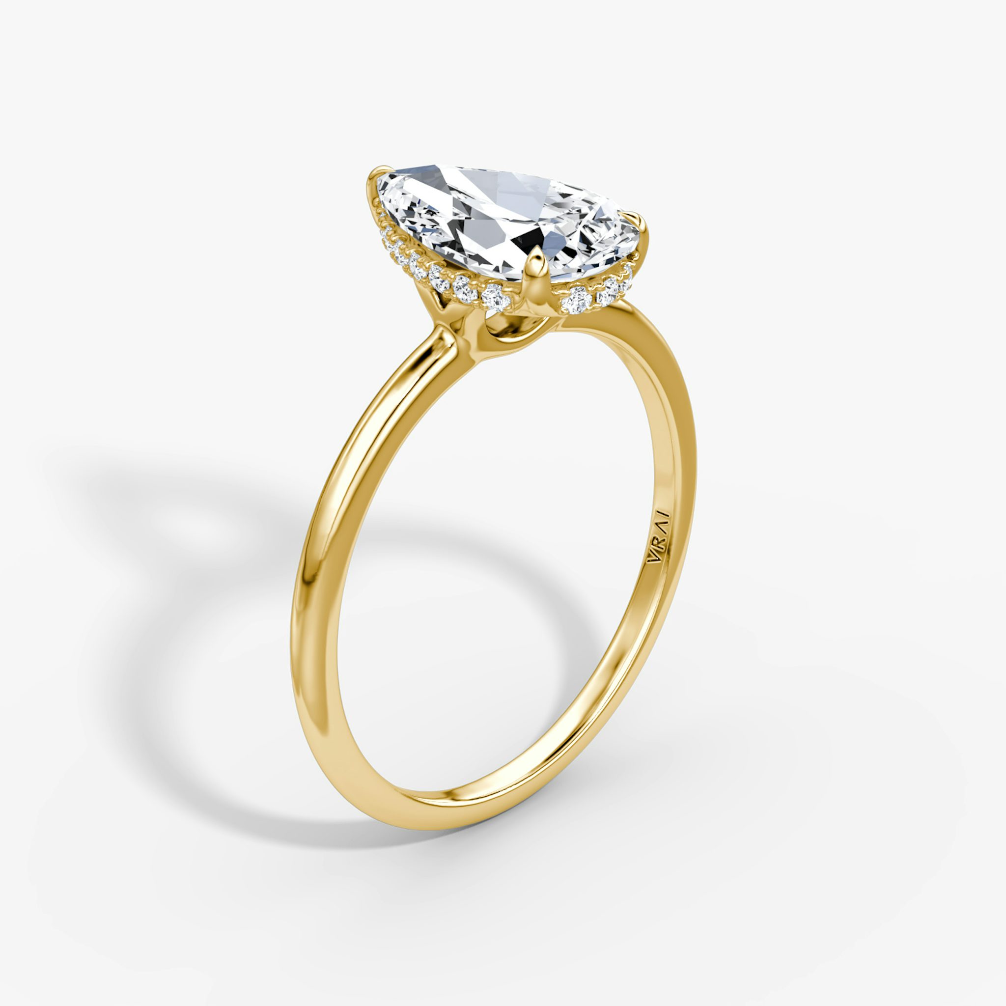 The Signature | Pear | 18k | Yellow Gold | bandAccent: Plain | bandWidth: standard | hiddenHalo: yes | diamondOrientation: vertical | caratWeight: other