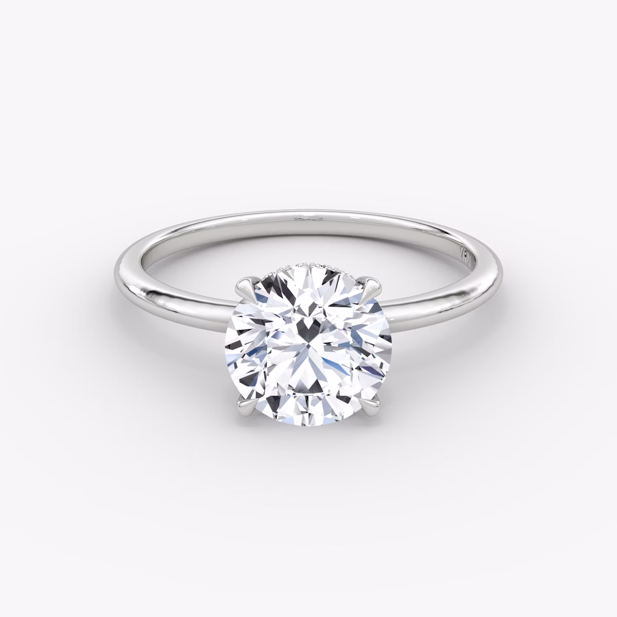 The Signature | Round Brilliant | 18k | White Gold | bandAccent: Plain | bandWidth: standard | caratWeight: 1.5ct | hiddenHalo: yes | diamondOrientation: vertical