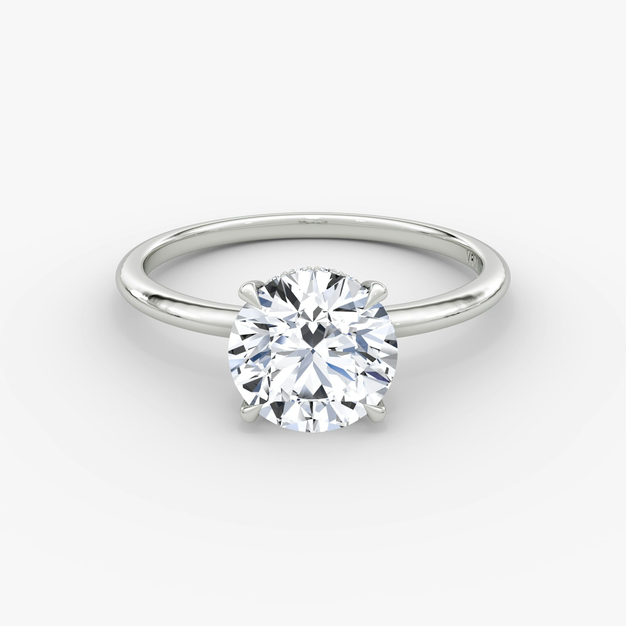 The Signature | Round Brilliant | Platinum | bandAccent: Plain | bandWidth: standard | caratWeight: 1.0ct | hiddenHalo: yes | diamondOrientation: vertical