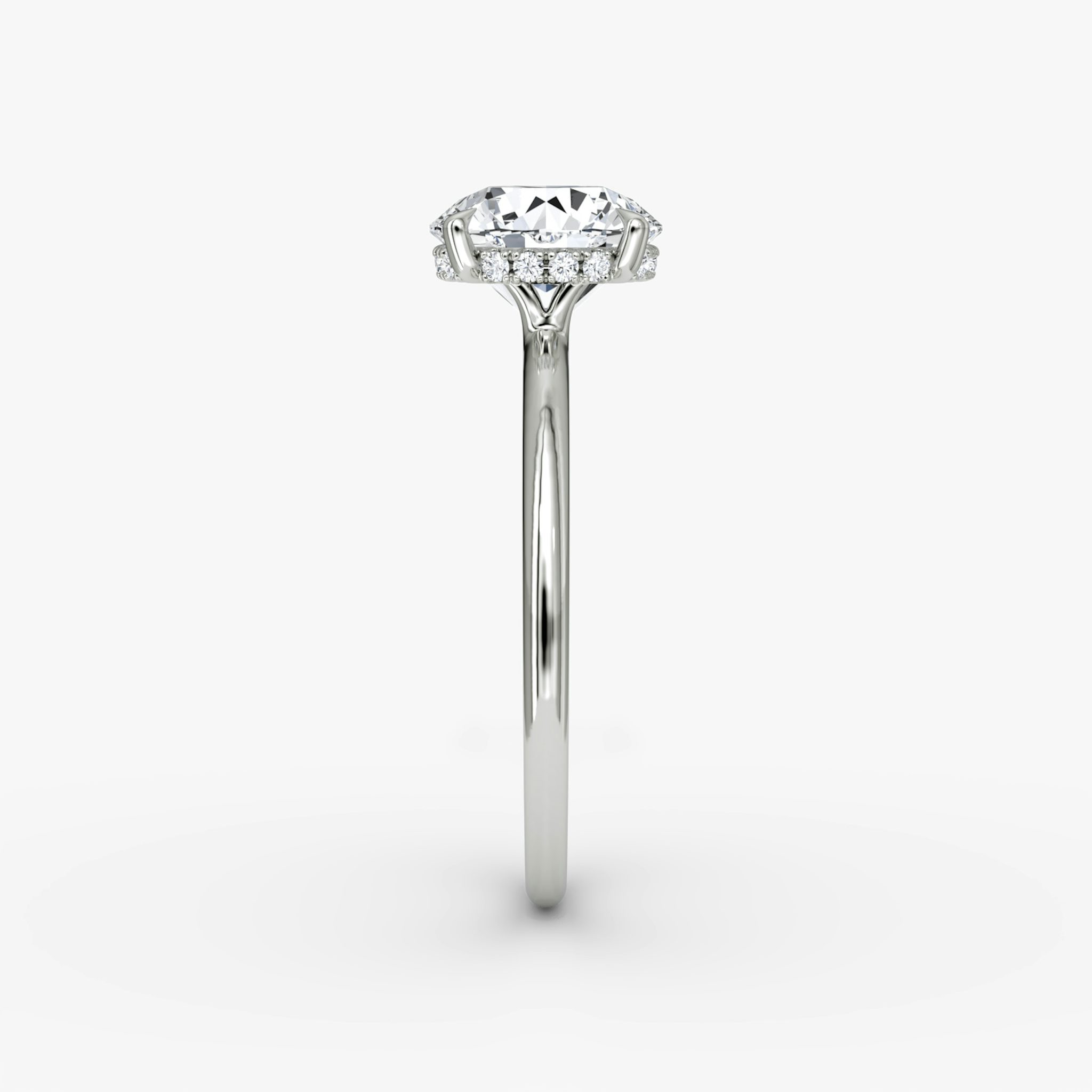The Signature | Round Brilliant | Platinum | bandAccent: Plain | bandWidth: standard | caratWeight: 1.0ct | hiddenHalo: yes | diamondOrientation: vertical