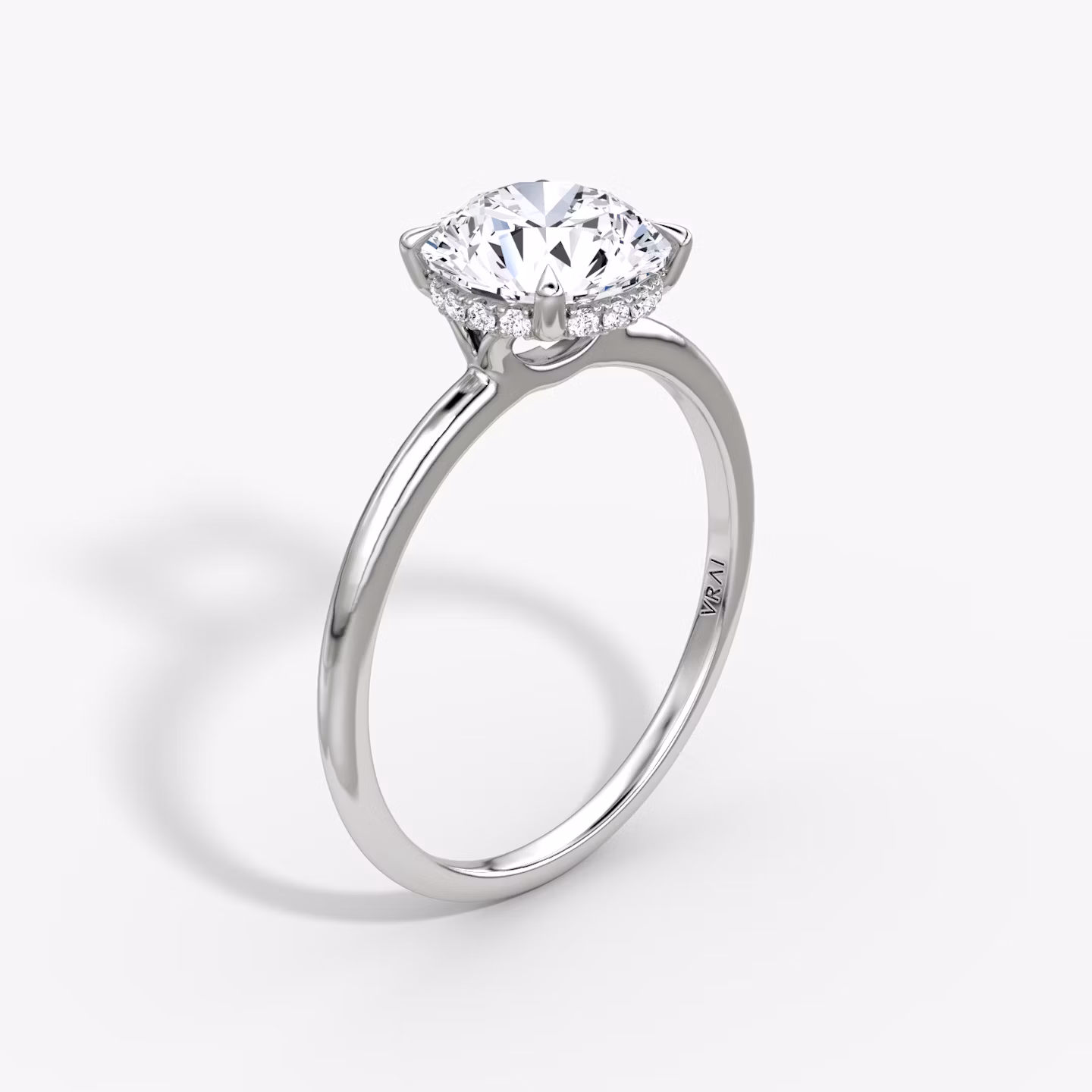 The Signature | Round Brilliant | 18k | White Gold | bandAccent: Plain | bandWidth: standard | caratWeight: 2.0ct | hiddenHalo: yes | diamondOrientation: vertical