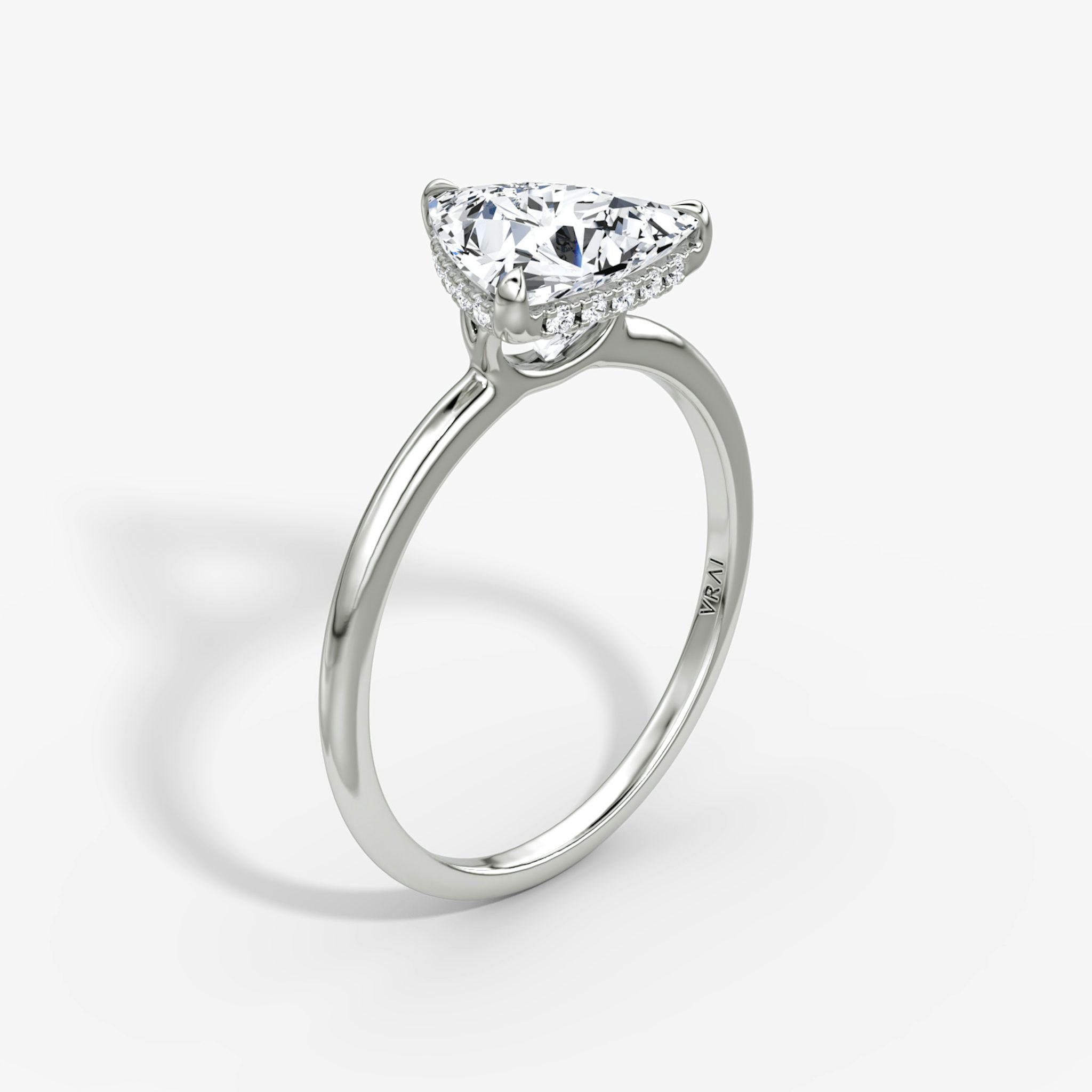 The Signature | Trillion | 18k | White Gold | bandAccent: Plain | bandWidth: standard | hiddenHalo: yes | diamondOrientation: vertical | caratWeight: other