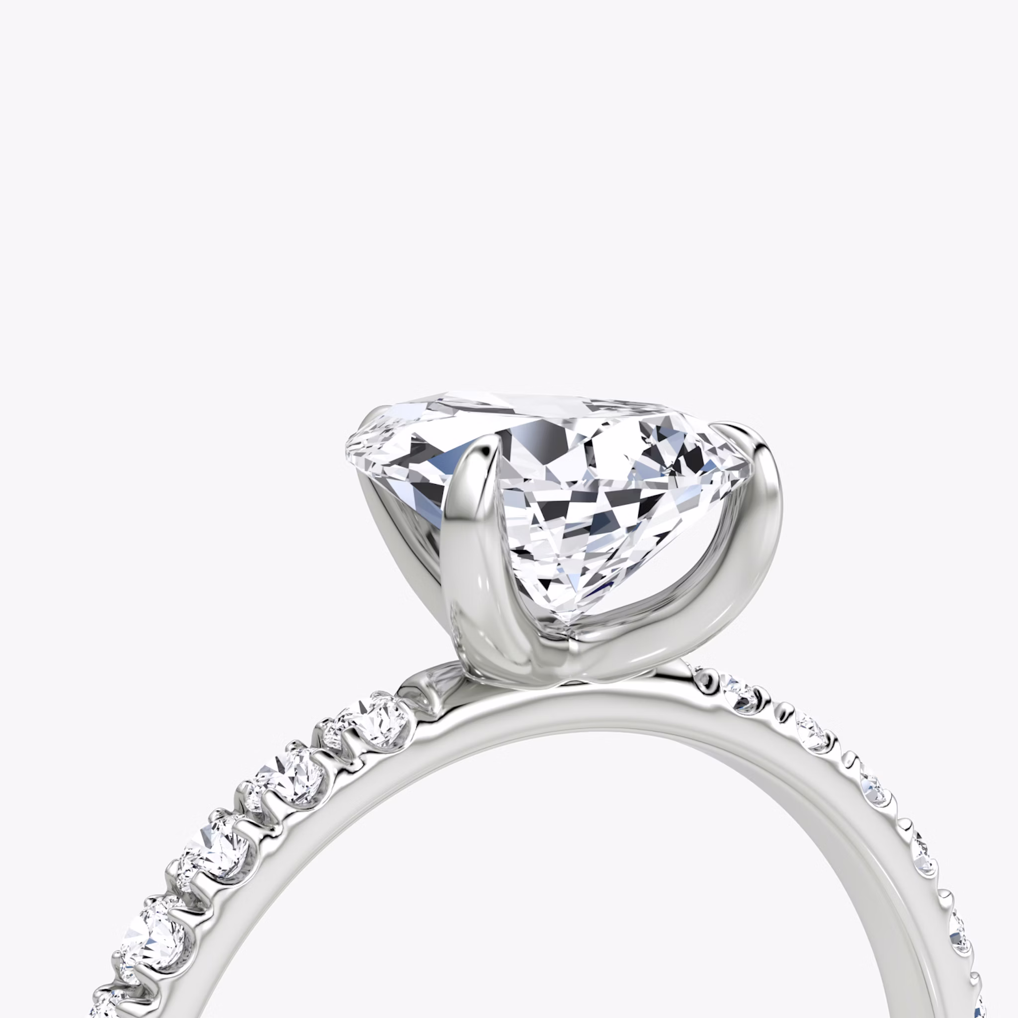 The Classic | Pear | Platinum | bandAccent: Pavé | bandWidth: large | diamondOrientation: vertical | caratWeight: other
