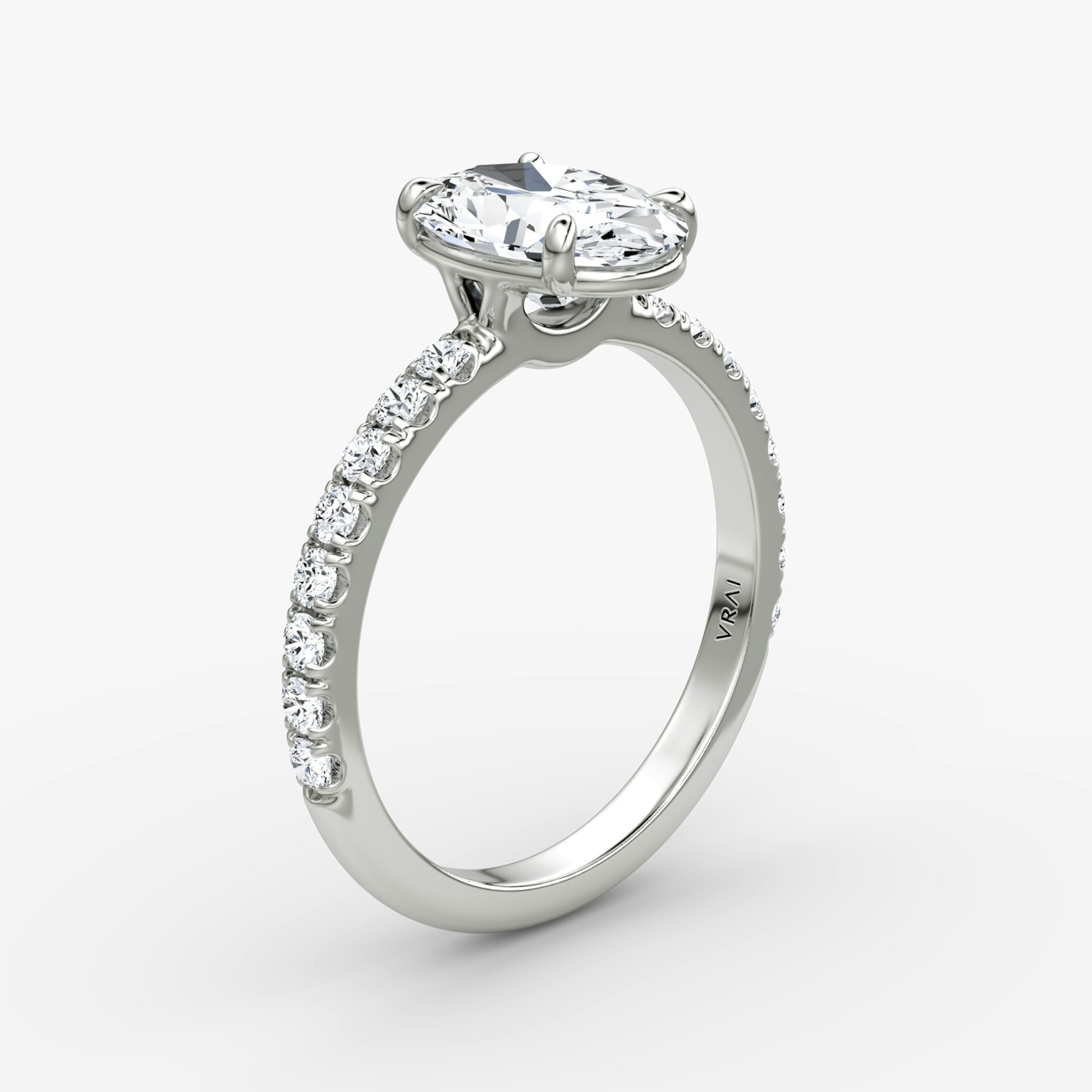 The Signature | Oval | 18k | White Gold | bandAccent: Pavé | bandWidth: large | hiddenHalo: no | diamondOrientation: vertical | caratWeight: other