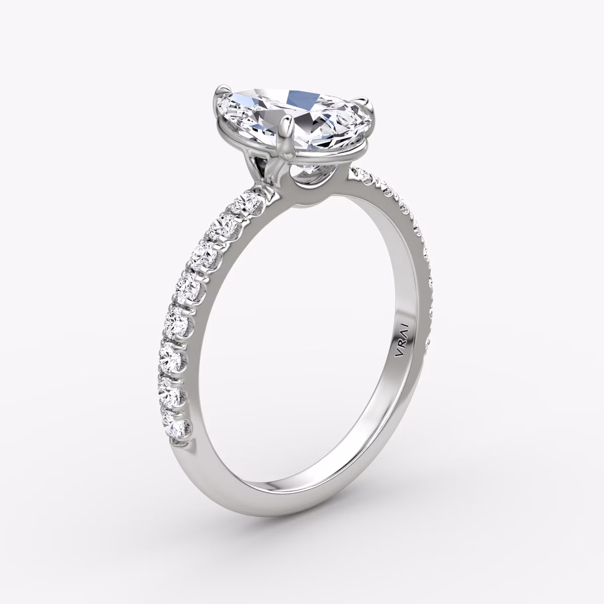 The Signature | Pear | 18k | White Gold | bandAccent: Pavé | bandWidth: large | hiddenHalo: no | diamondOrientation: vertical | caratWeight: other