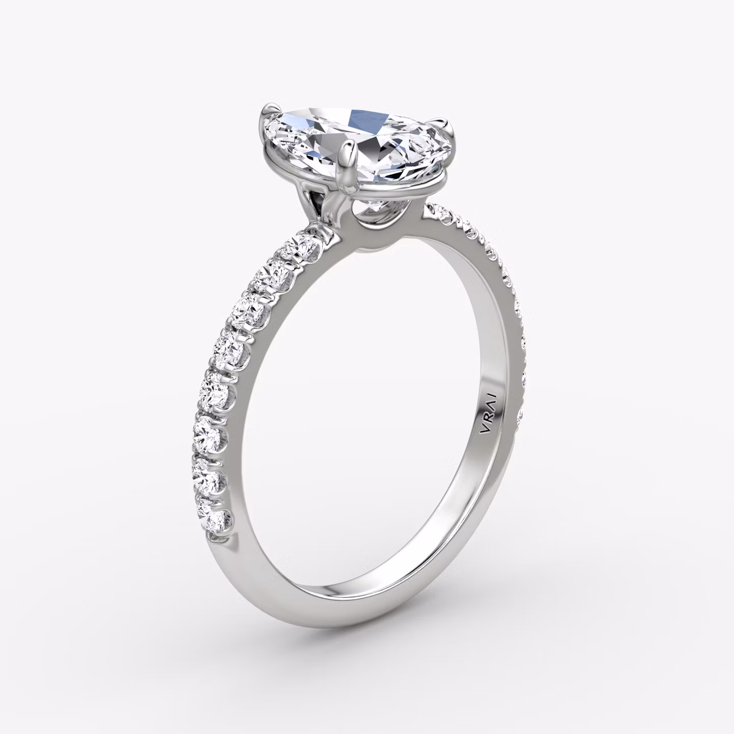 The Signature | Pear | Platinum | bandAccent: Pavé | bandWidth: large | hiddenHalo: no | diamondOrientation: vertical | caratWeight: other