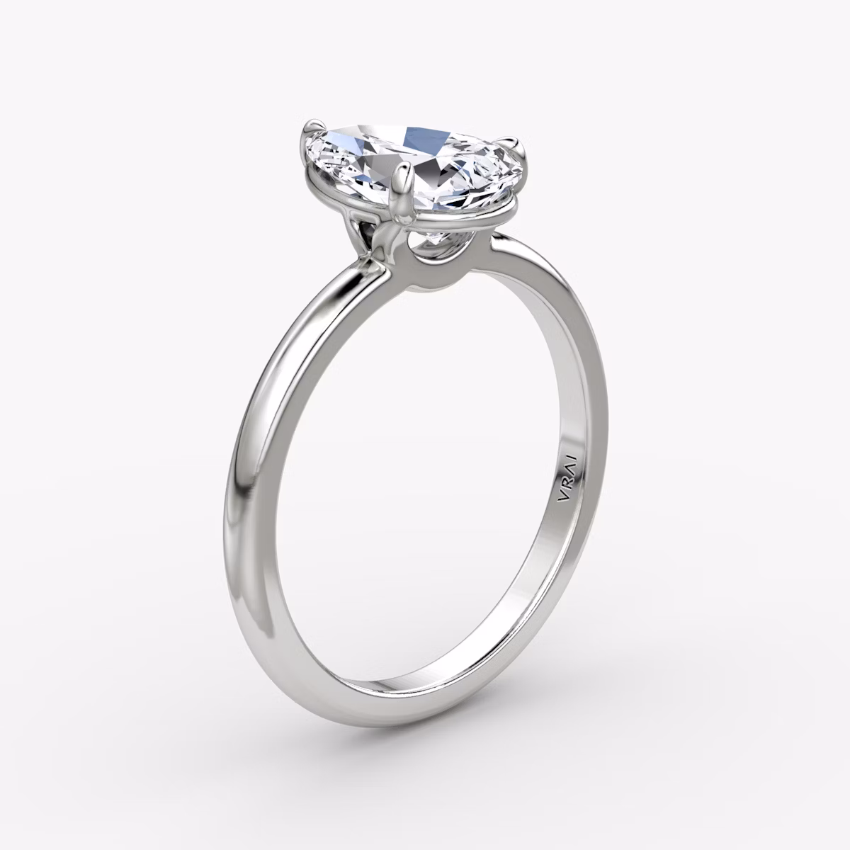 The Signature | Pear | 18k | White Gold | bandAccent: Plain | bandWidth: large | hiddenHalo: no | diamondOrientation: vertical | caratWeight: other