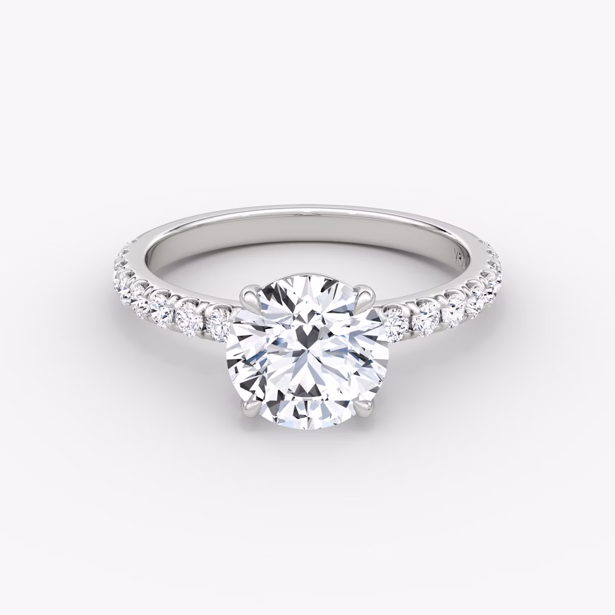The Signature | Round Brilliant | Platinum | bandAccent: Pavé | bandWidth: large | caratWeight: 1.0ct | hiddenHalo: no | diamondOrientation: vertical