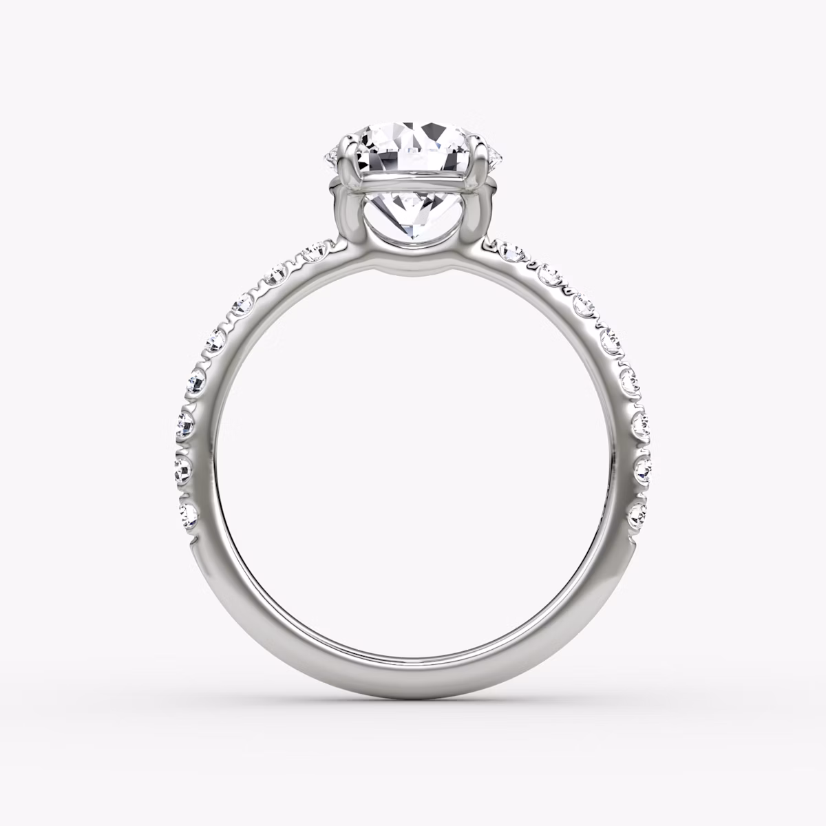 The Signature | Round Brilliant | Platinum | bandAccent: Pavé | bandWidth: large | caratWeight: 1.0ct | hiddenHalo: no | diamondOrientation: vertical