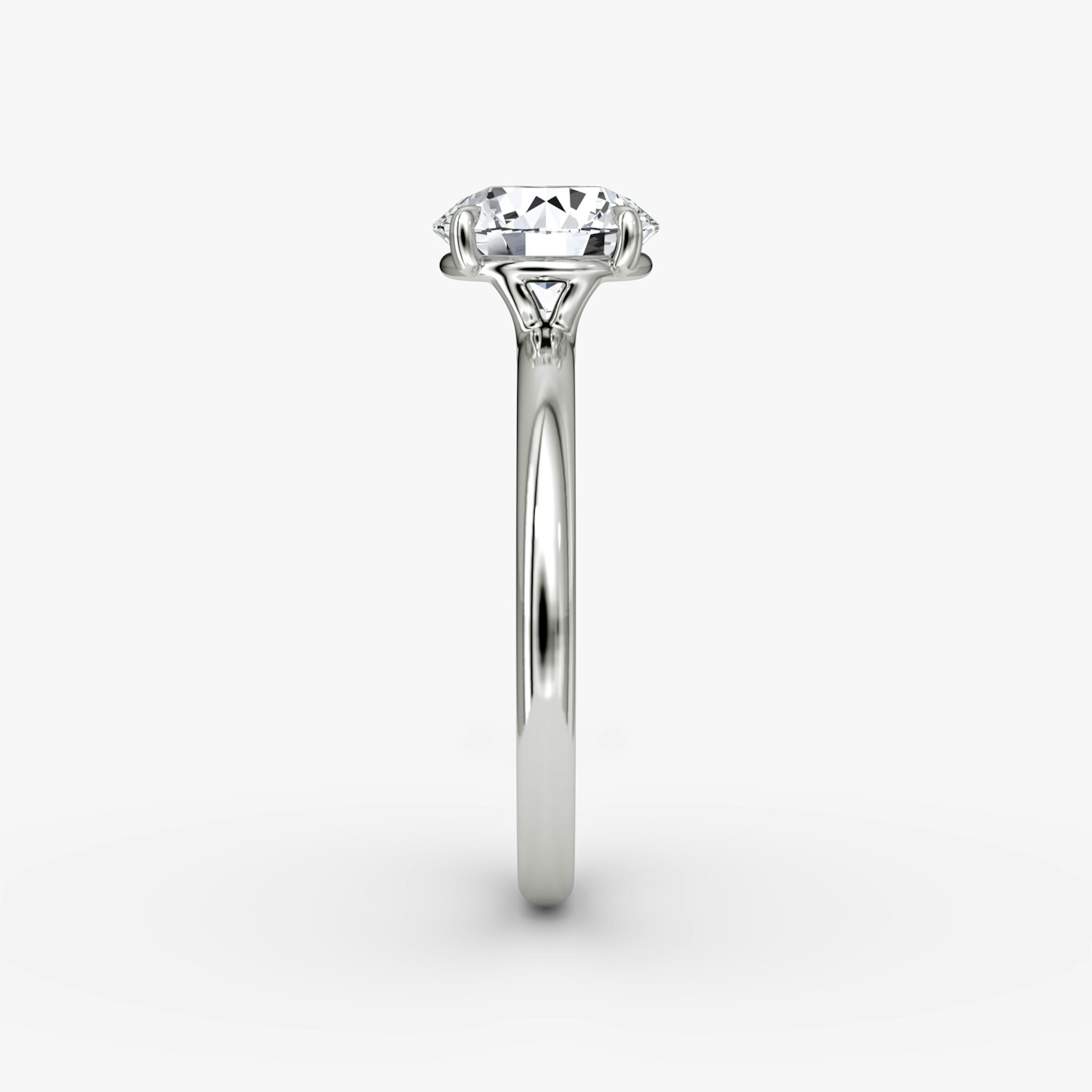 The Signature | Round Brilliant | Platinum | bandAccent: Plain | bandWidth: large | caratWeight: other | hiddenHalo: no | diamondOrientation: vertical