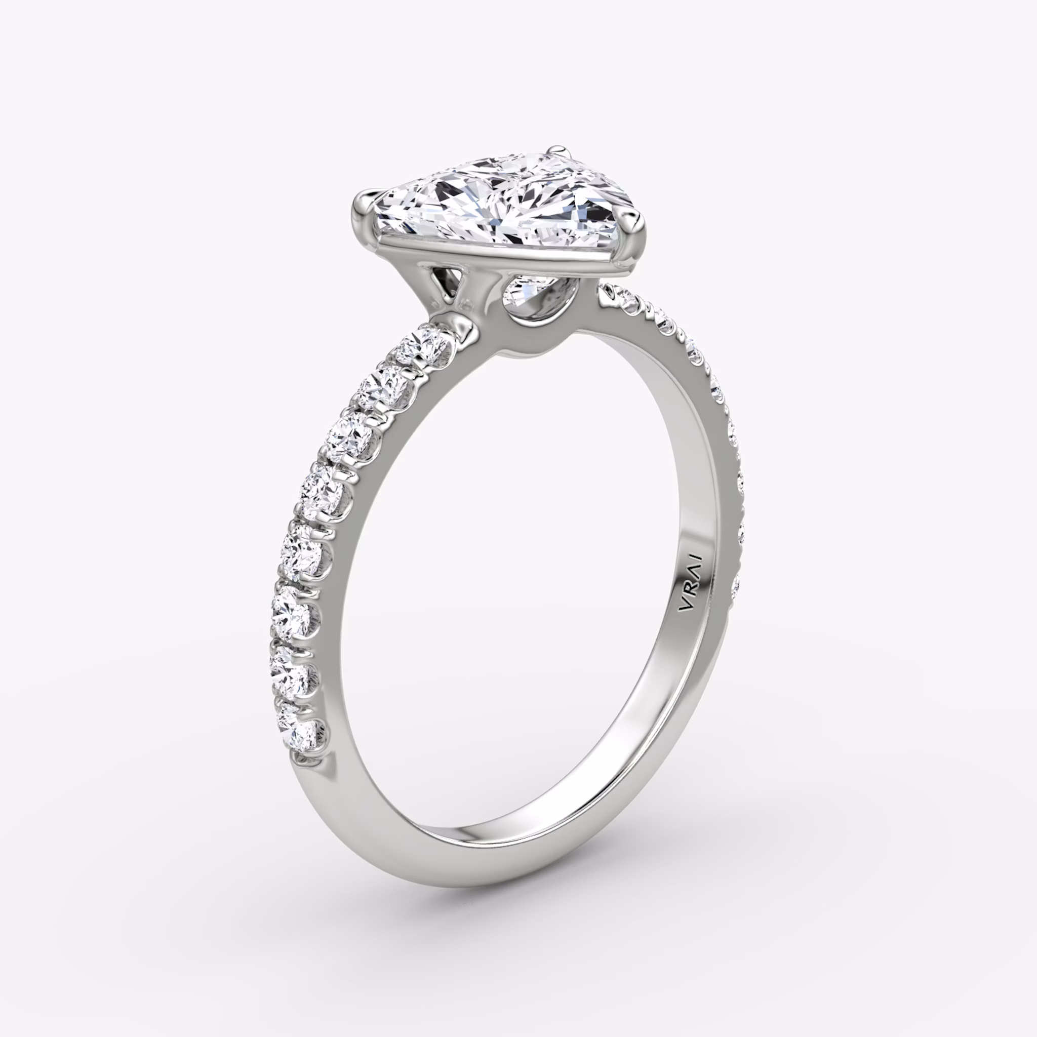 The Signature | Trillion | 18k | White Gold | bandAccent: Pavé | bandWidth: large | hiddenHalo: no | diamondOrientation: vertical | caratWeight: other