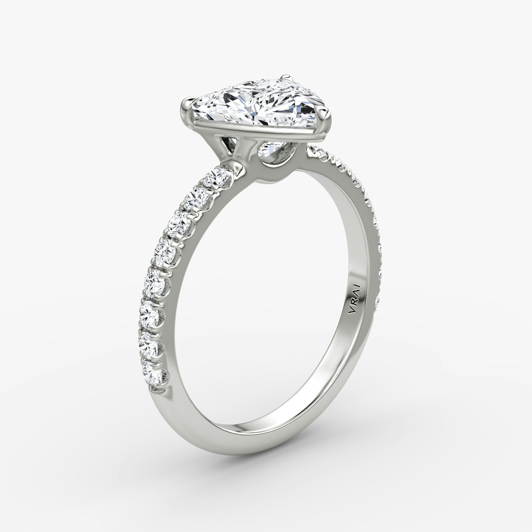 The Signature | Trillion | 18k | White Gold | bandAccent: Pavé | bandWidth: large | hiddenHalo: no | diamondOrientation: vertical | caratWeight: other
