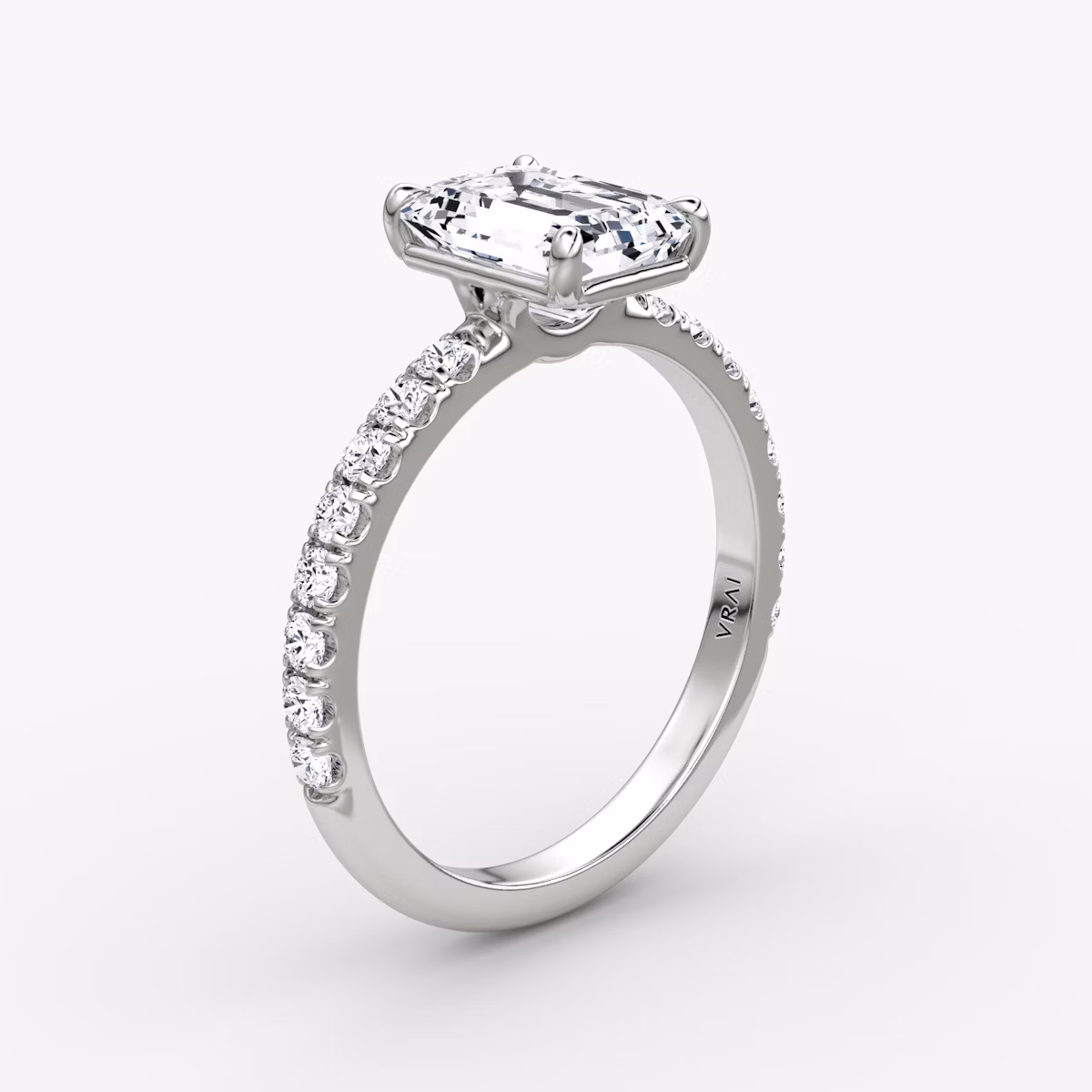 The Signature | Emerald | 18k | White Gold | bandAccent: Pavé | bandWidth: large | hiddenHalo: no | diamondOrientation: vertical | caratWeight: other