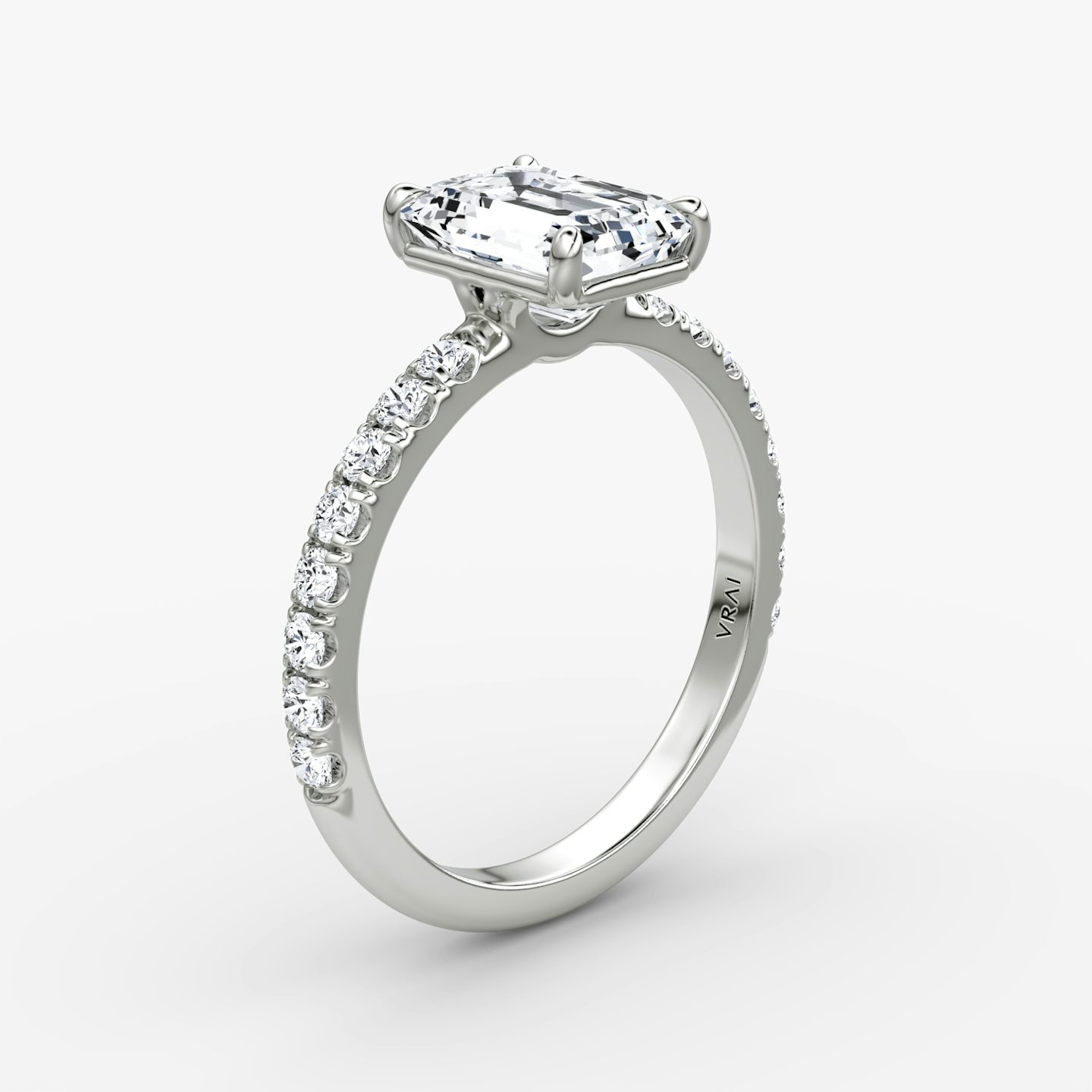 The Signature | Emerald | Platinum | bandAccent: Pavé | bandWidth: large | hiddenHalo: no | diamondOrientation: vertical | caratWeight: other