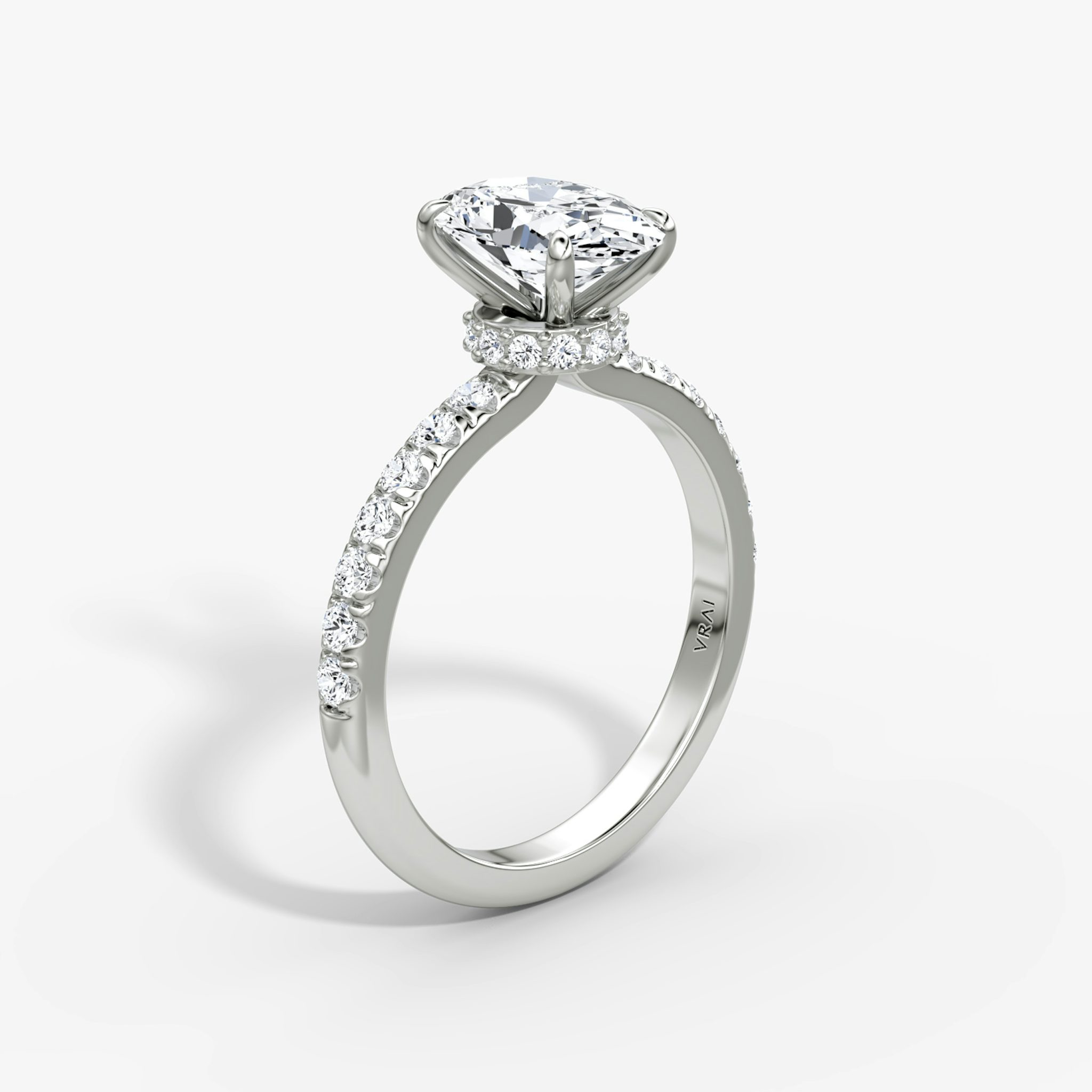 The Veiled Halo | Oval | Platinum | bandAccent: Pavé | diamondOrientation: vertical | caratWeight: other