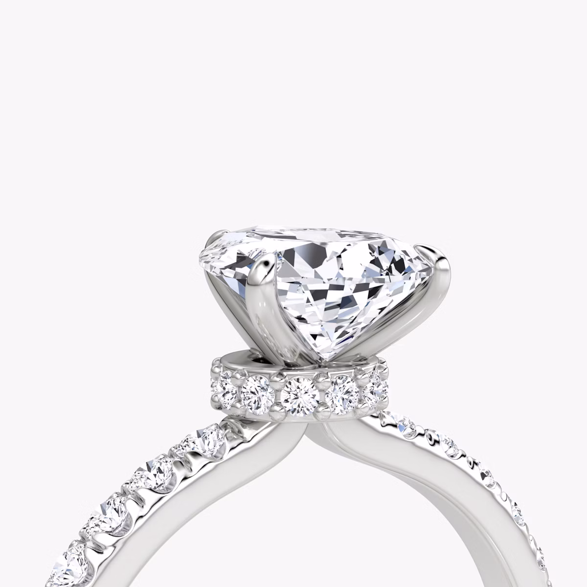 The Veiled Halo | Pear | Platinum | bandAccent: Pavé | diamondOrientation: vertical | caratWeight: other