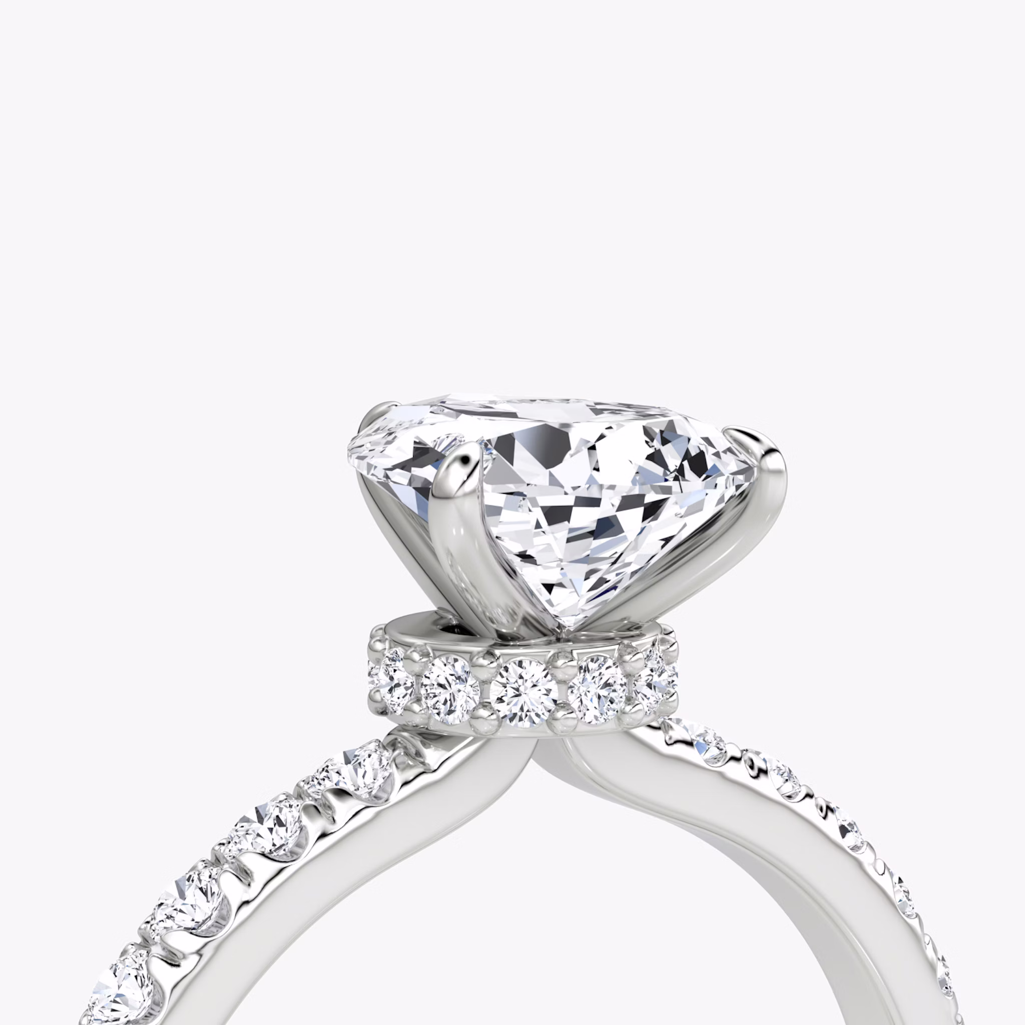 The Veiled Halo | Pear | 18k | White Gold | bandAccent: Pavé | diamondOrientation: vertical | caratWeight: other