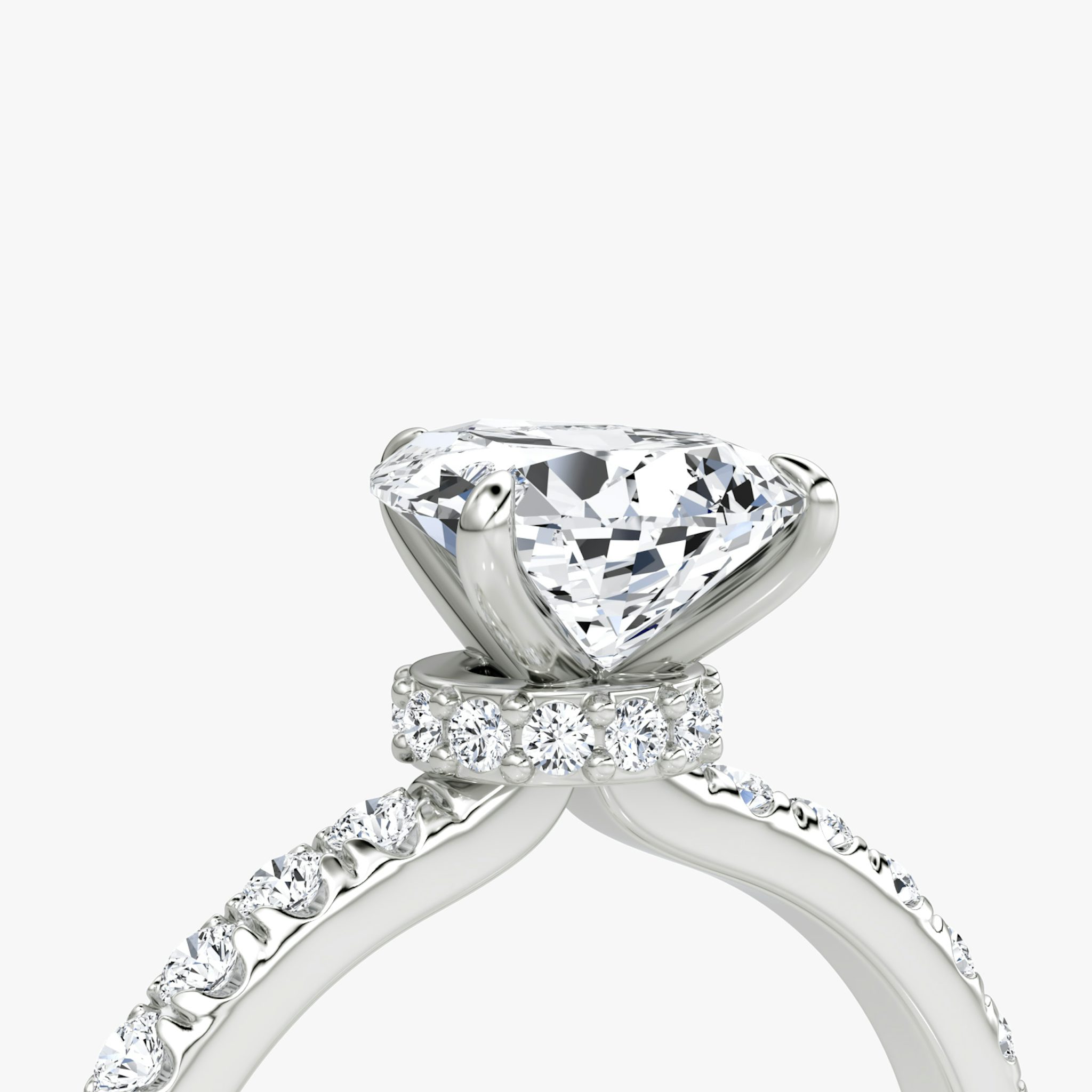 The Veiled Halo | Pear | 18k | White Gold | bandAccent: Pavé | diamondOrientation: vertical | caratWeight: other