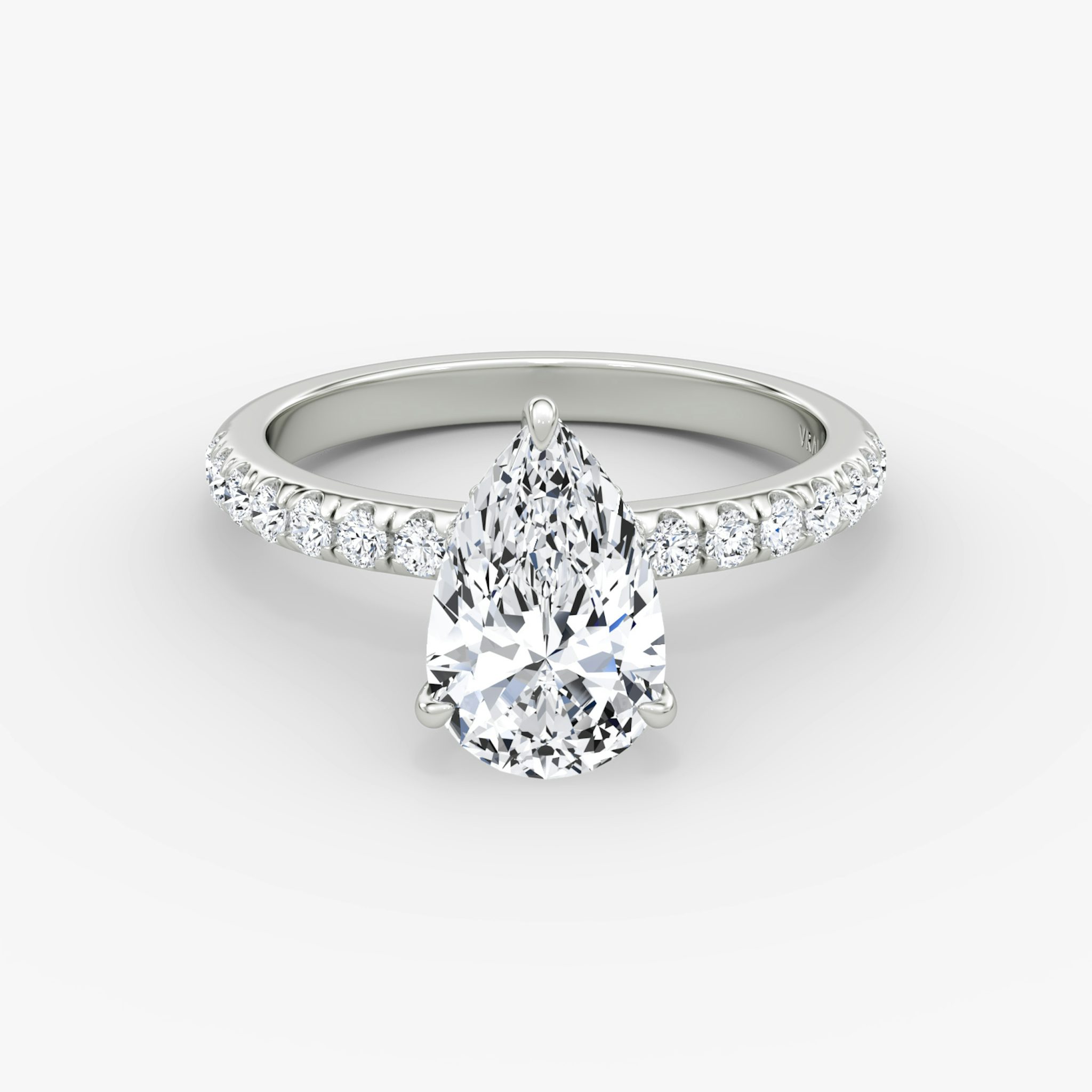 The Veiled Halo | Pear | 18k | White Gold | bandAccent: Pavé | diamondOrientation: vertical | caratWeight: other