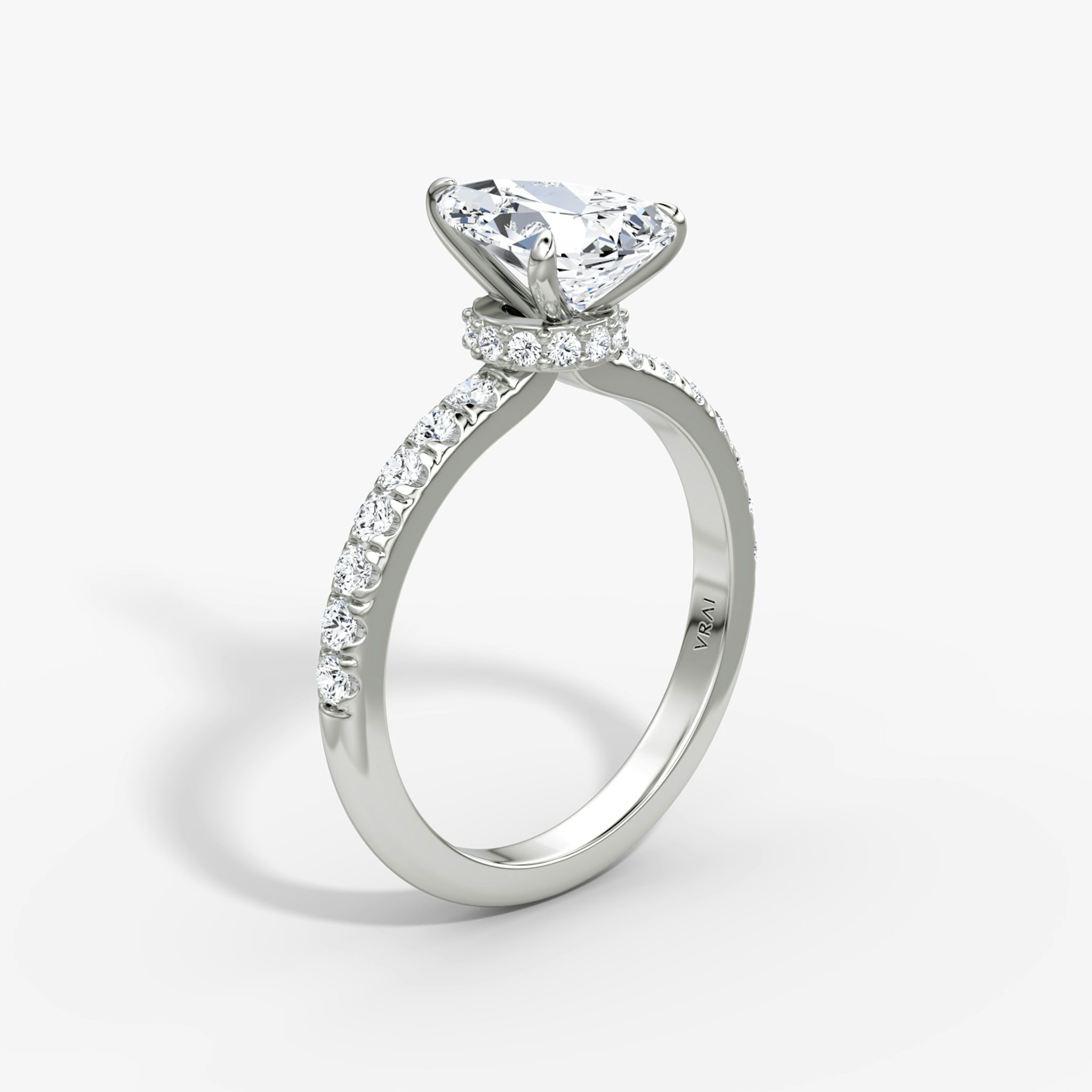 The Veiled Halo | Pear | 18k | White Gold | bandAccent: Pavé | diamondOrientation: vertical | caratWeight: other