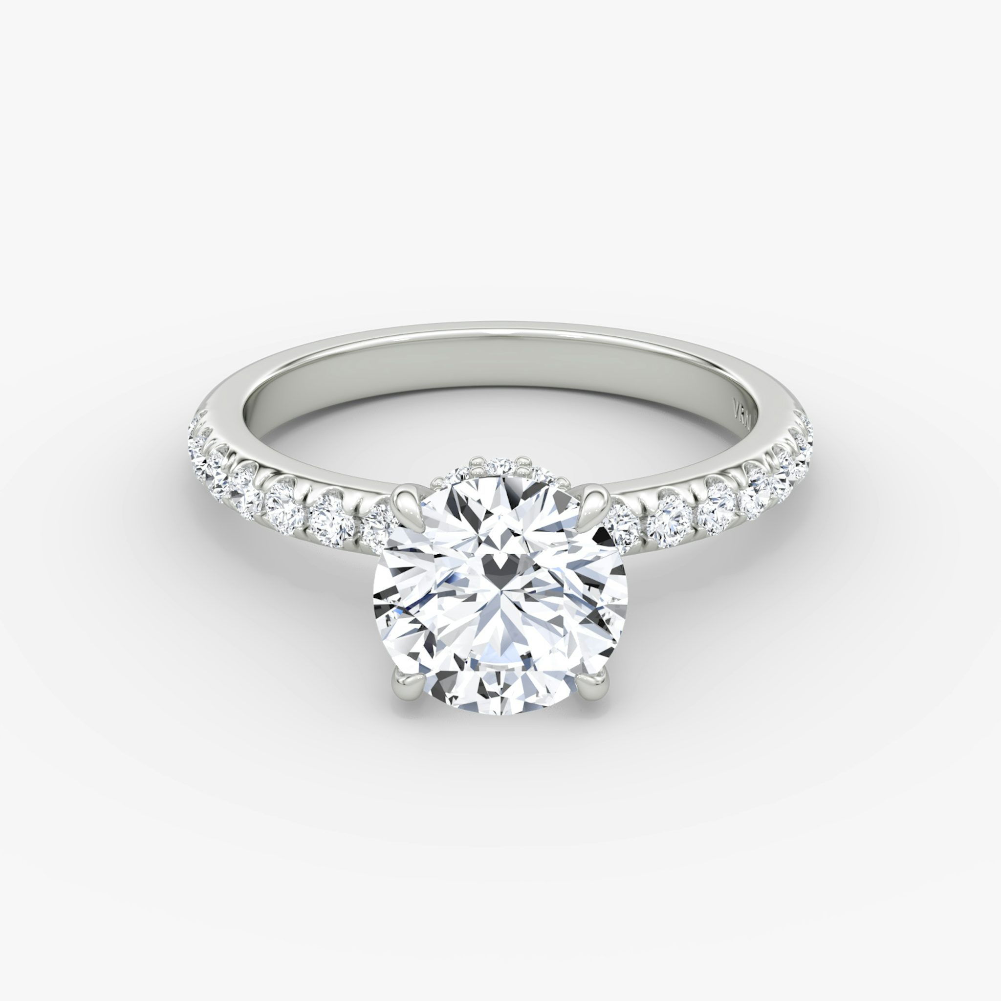 The Veiled Halo | Round Brilliant | Platinum | bandAccent: Pavé | caratWeight: 1.5ct | diamondOrientation: vertical