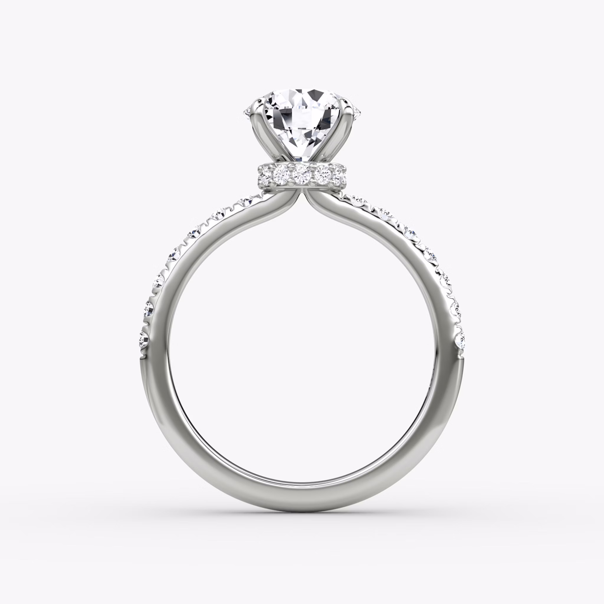 The Veiled Halo | Round Brilliant | Platinum | bandAccent: Pavé | caratWeight: 1.5ct | diamondOrientation: vertical