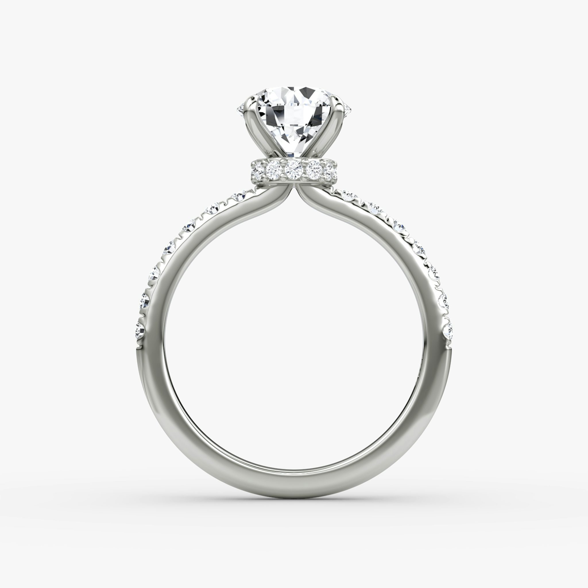 The Veiled Halo | Round Brilliant | Platinum | bandAccent: Pavé | caratWeight: 1.5ct | diamondOrientation: vertical