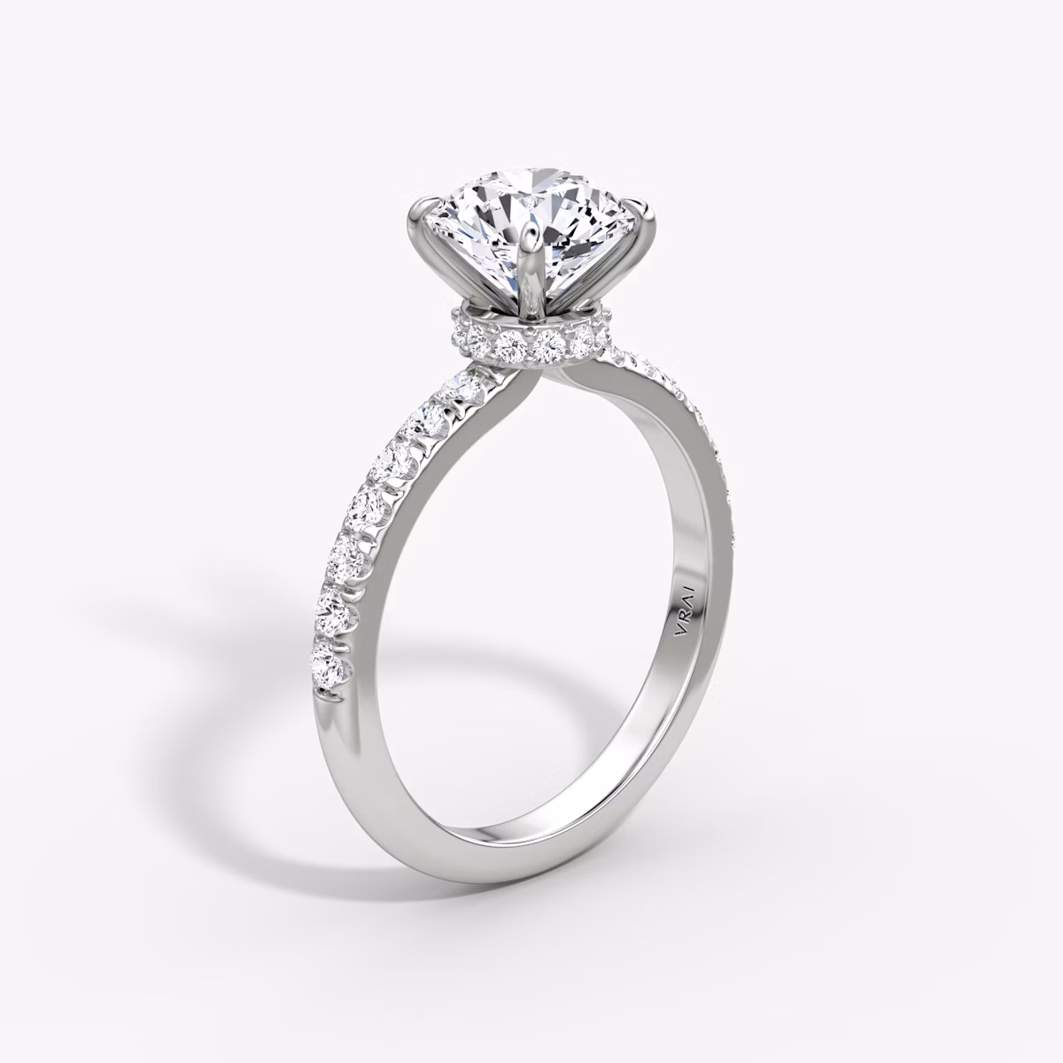 The Veiled Halo | Round Brilliant | Platinum | bandAccent: Pavé | caratWeight: other | diamondOrientation: vertical