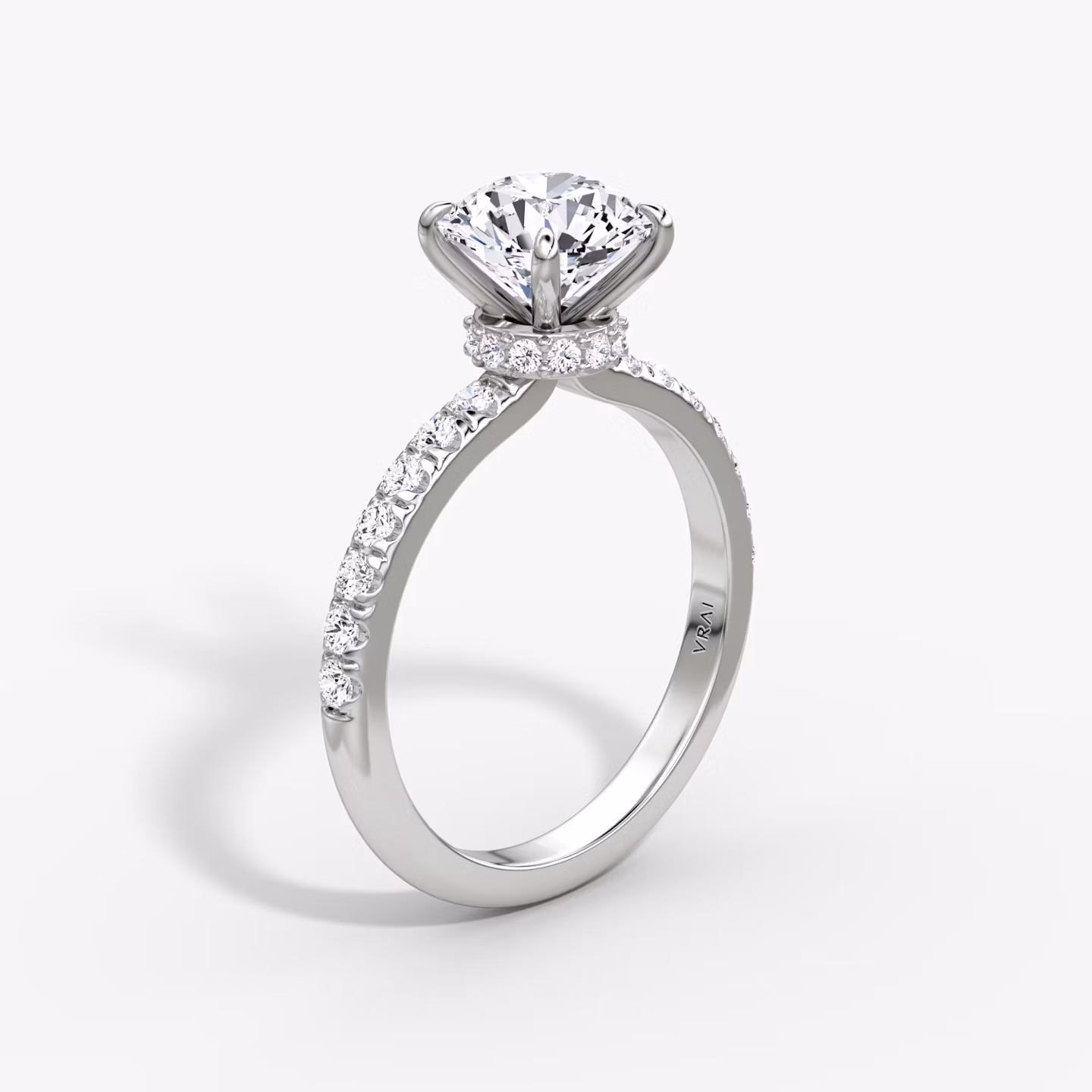 The Veiled Halo | Round Brilliant | Platinum | bandAccent: Pavé | caratWeight: other | diamondOrientation: vertical