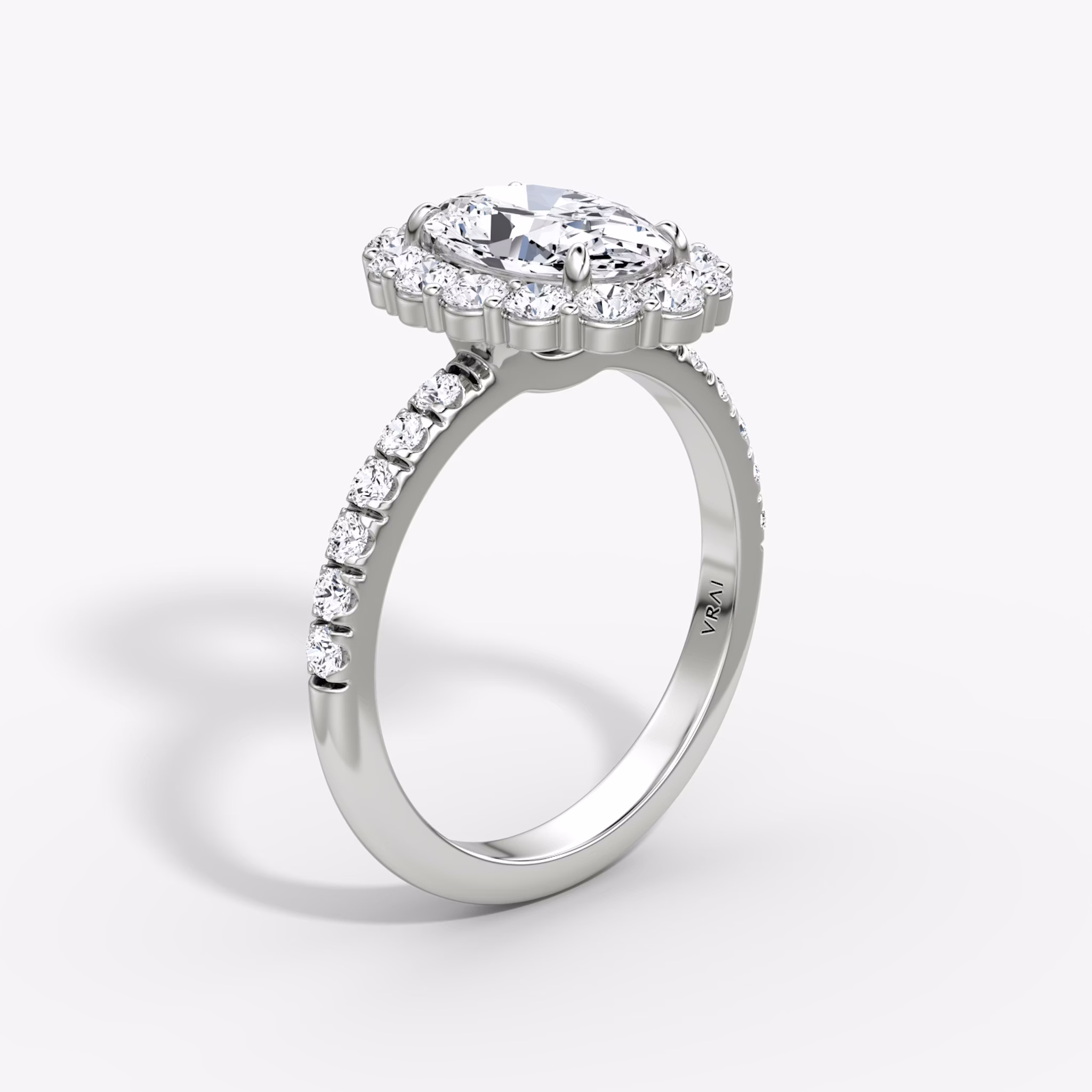 The Signature Floral Halo | Oval | 18k | White Gold | bandAccent: Pavé | diamondOrientation: vertical | caratWeight: other