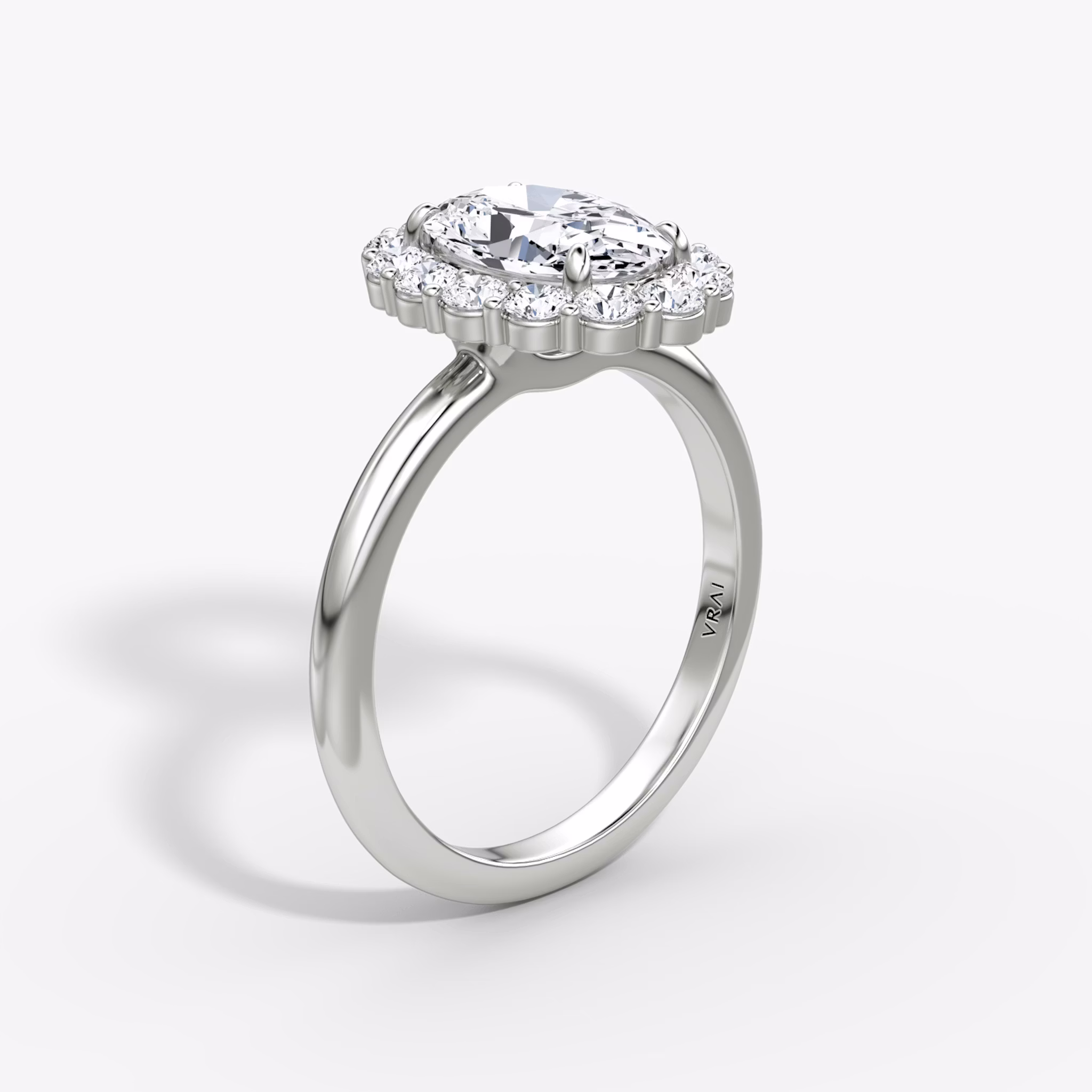 The Signature Floral Halo | Oval | Platinum | bandAccent: Plain | diamondOrientation: vertical | caratWeight: other