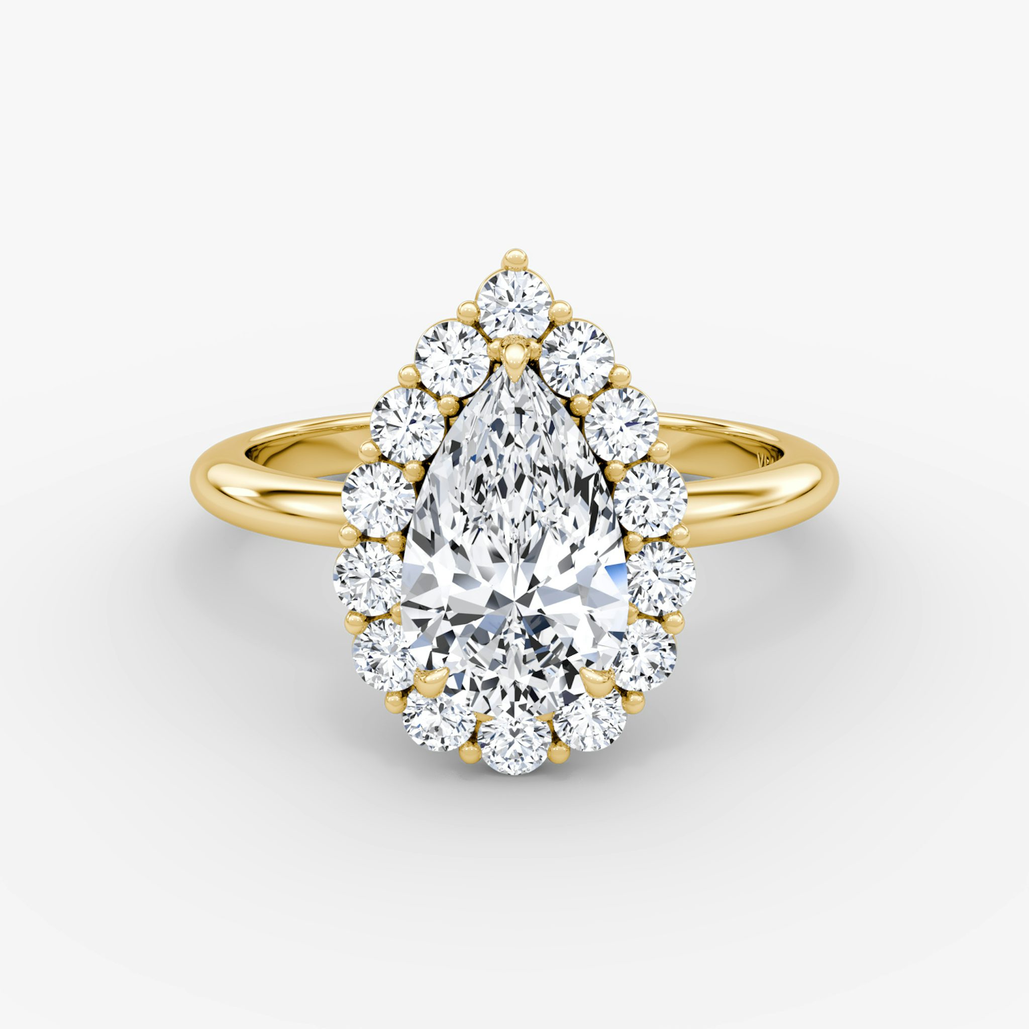 Front view of the signature floral halo pear yellow gold engagement ring