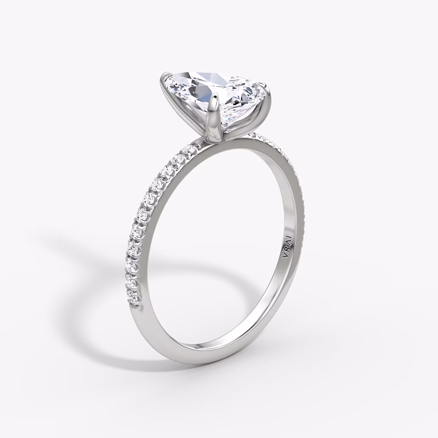 The Classic | Pear | Platinum | bandAccent: Pavé | bandWidth: standard | diamondOrientation: vertical | caratWeight: other