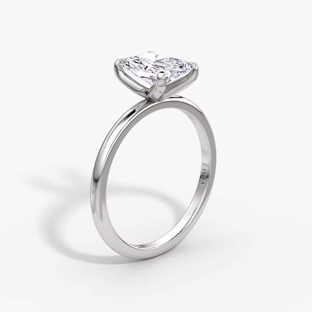 The Classic | Radiant | Platinum | bandAccent: Plain | bandWidth: standard | diamondOrientation: vertical | caratWeight: other