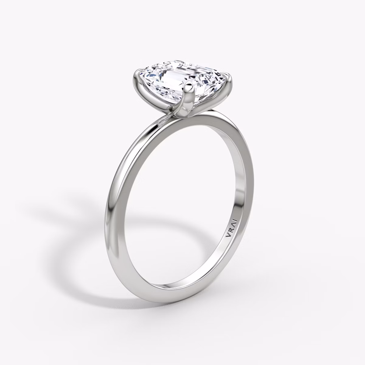 The Classic | Emerald | Platinum | bandAccent: Plain | bandWidth: standard | diamondOrientation: vertical | caratWeight: other