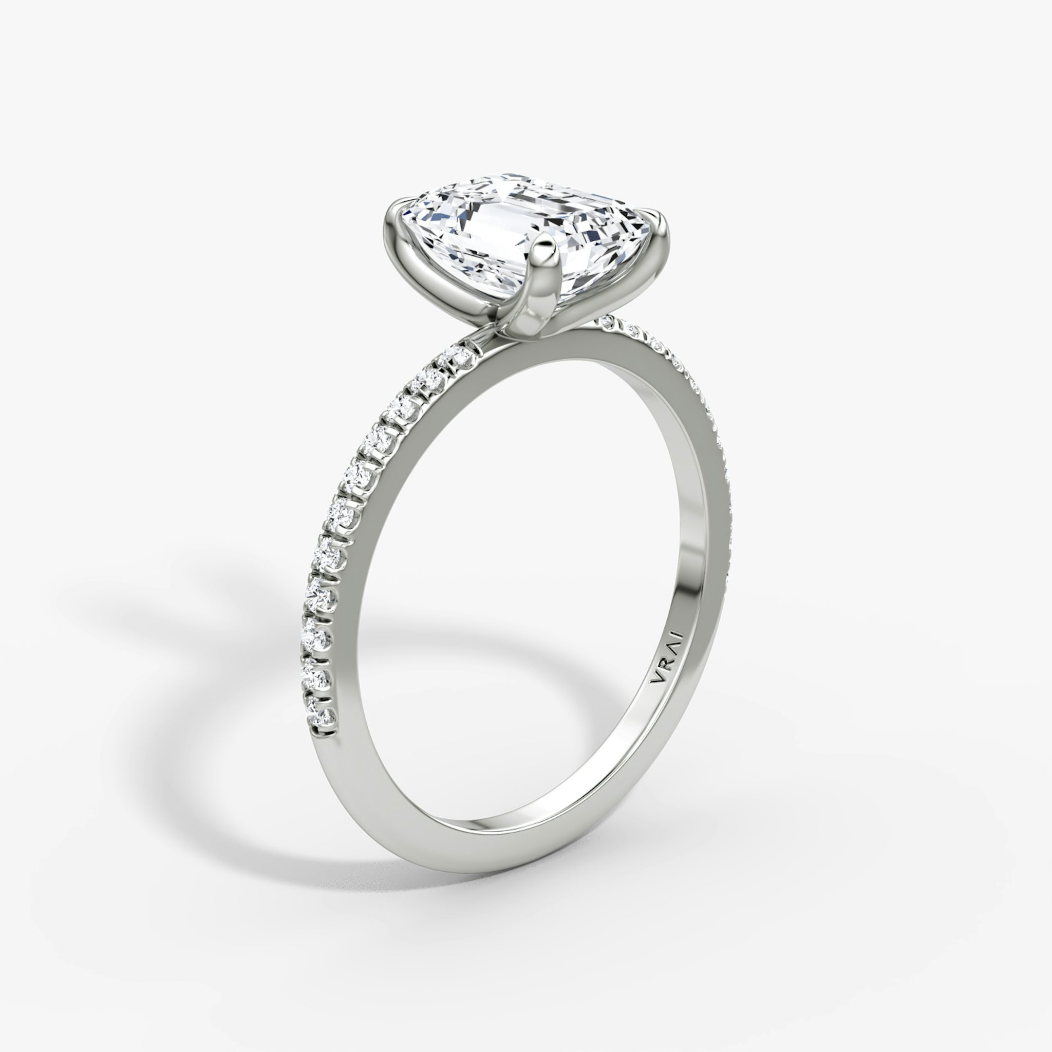 The Classic | Emerald | Platinum | bandAccent: Pavé | bandWidth: standard | diamondOrientation: vertical | caratWeight: other