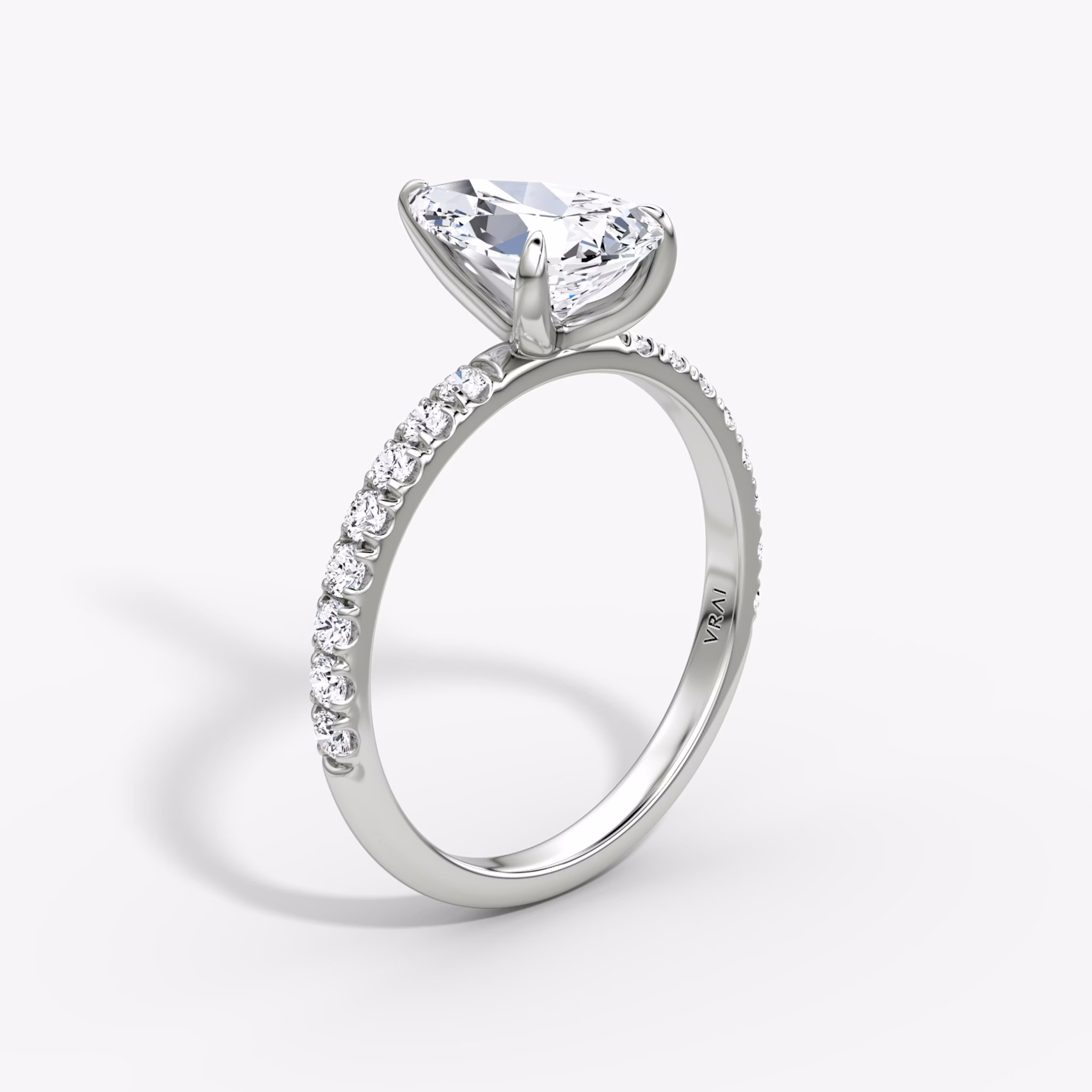 The Classic | Pear | Platinum | bandAccent: Pavé | bandWidth: large | diamondOrientation: vertical | caratWeight: other