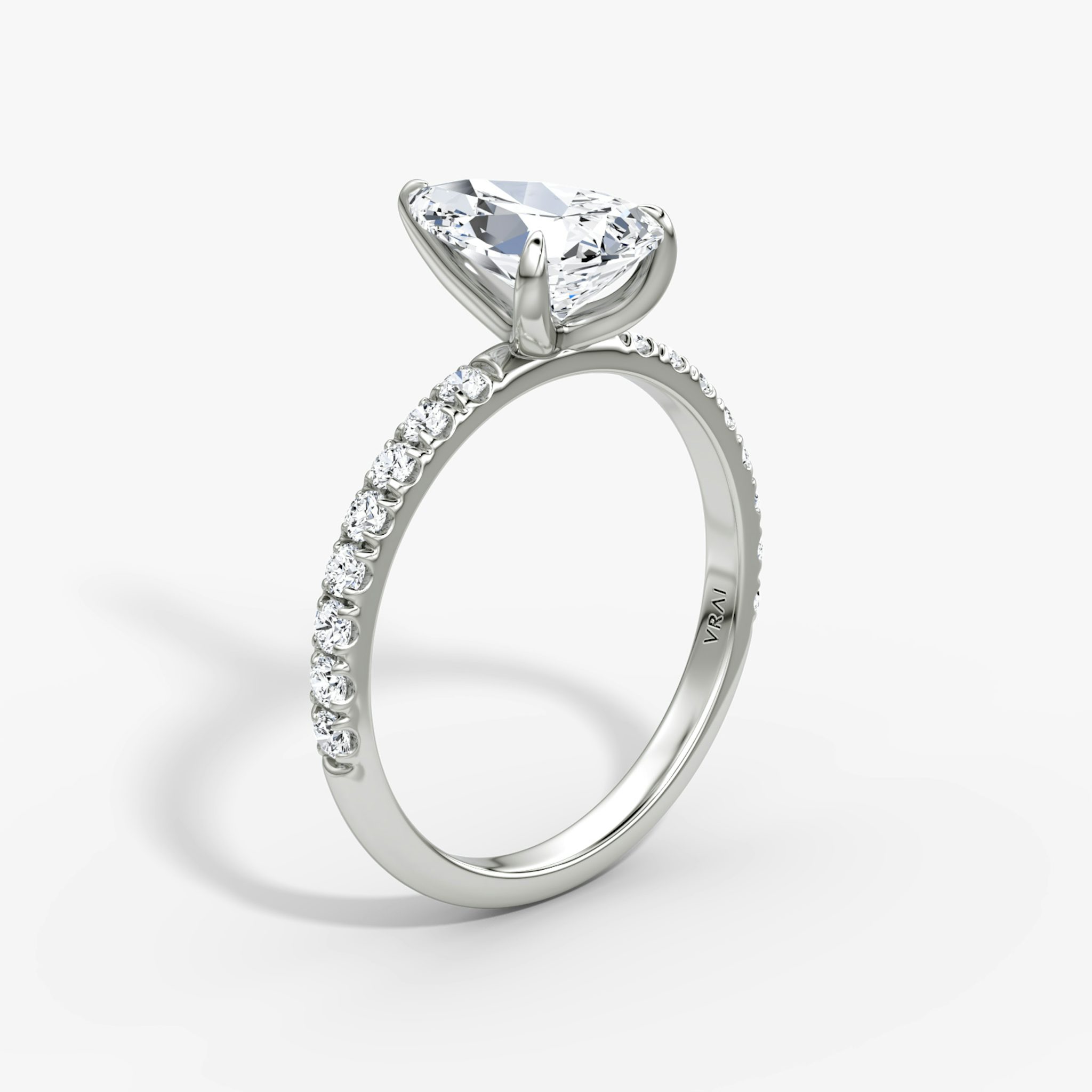 The Classic | Pear | Platinum | bandAccent: Pavé | bandWidth: large | diamondOrientation: vertical | caratWeight: other
