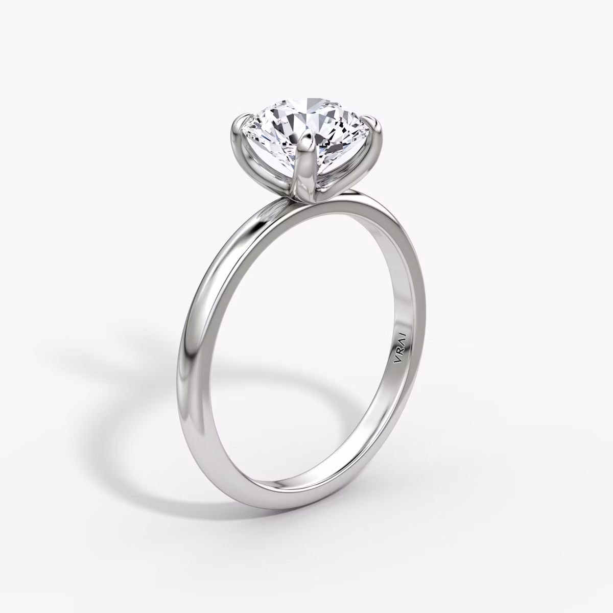 The Classic | Round Brilliant | Platinum | bandAccent: Plain | bandWidth: large | caratWeight: 1.5ct | diamondOrientation: vertical